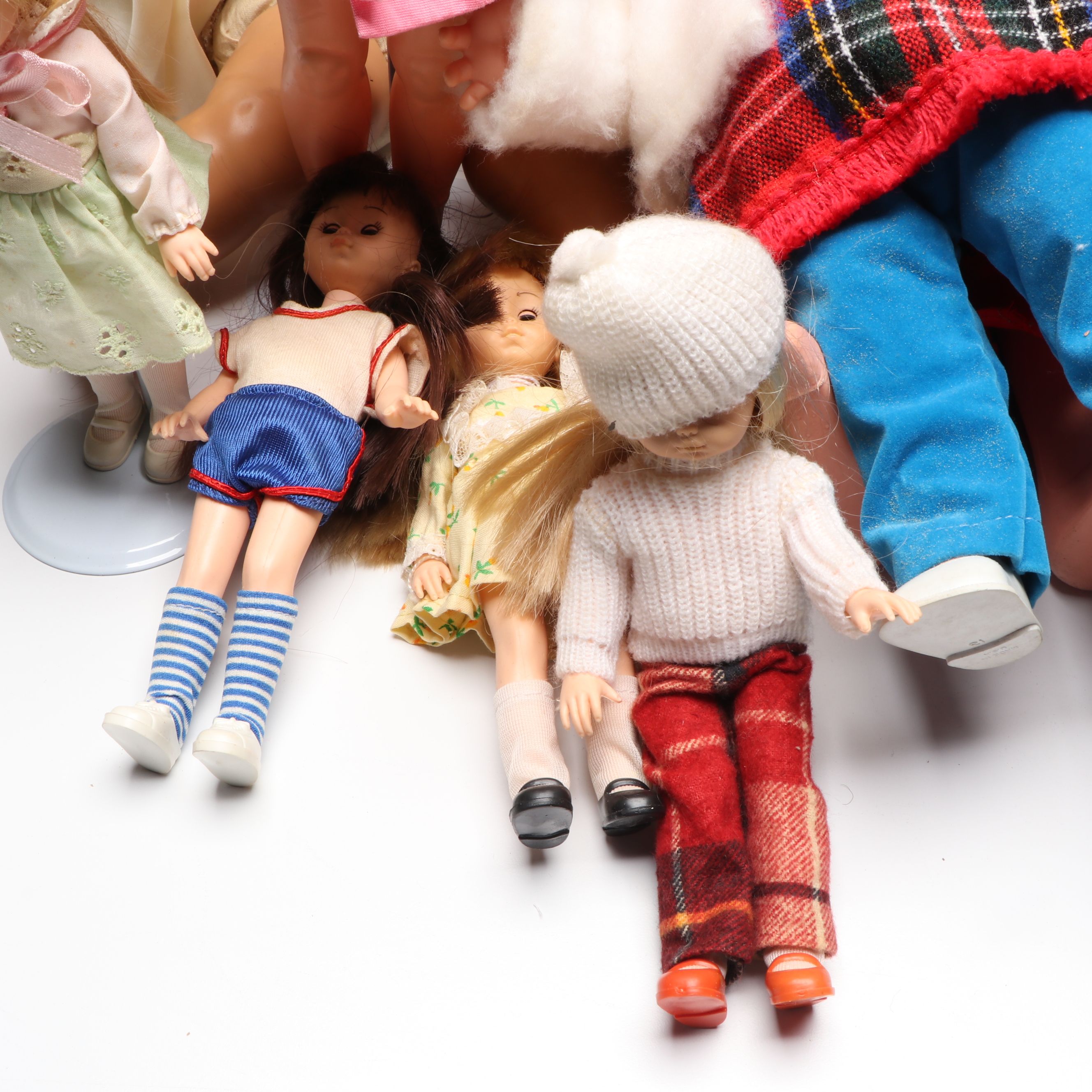 Vogue Ginny and Other Plastic Dolls with Clothing and Cradle, 1970s