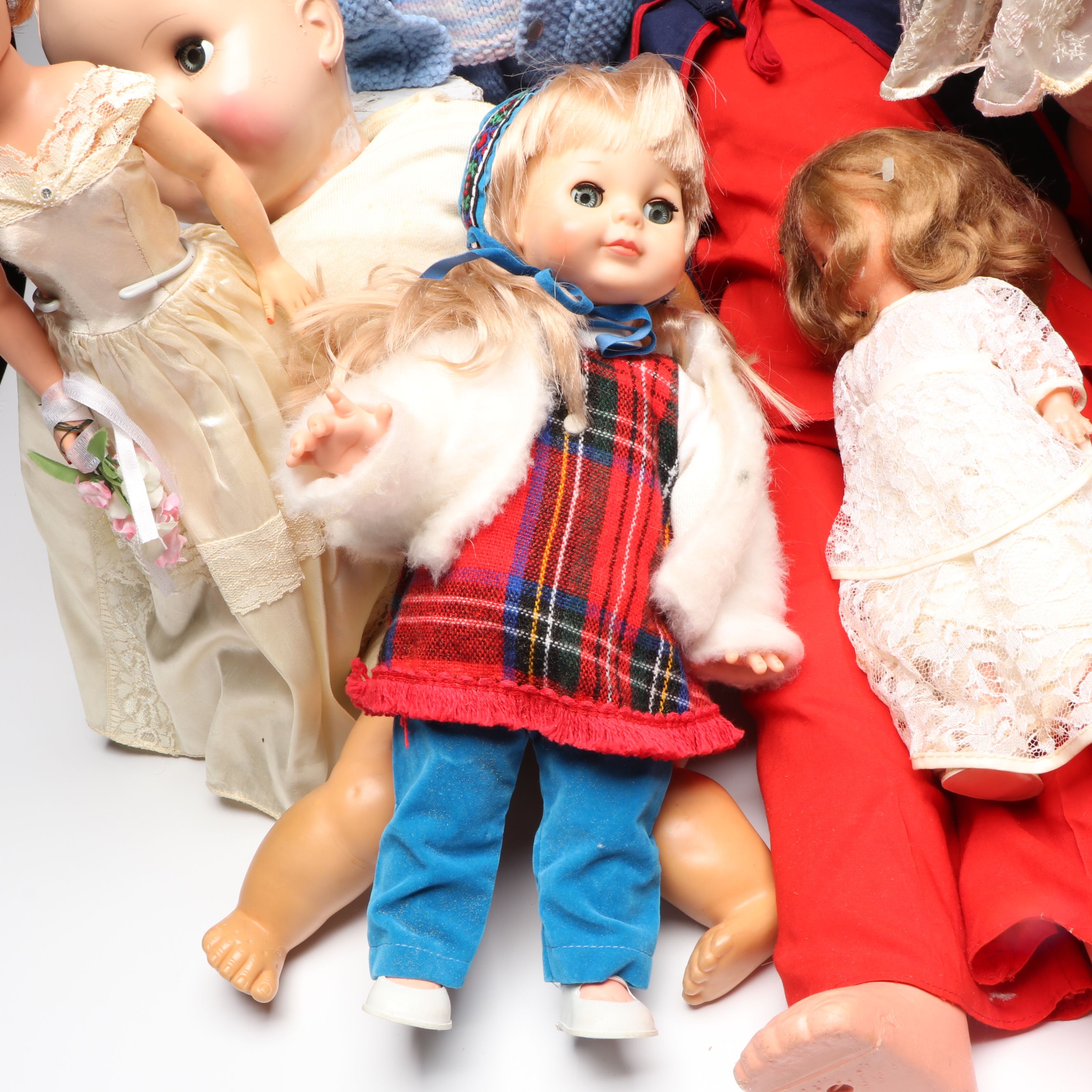 Vogue Ginny and Other Plastic Dolls with Clothing and Cradle, 1970s