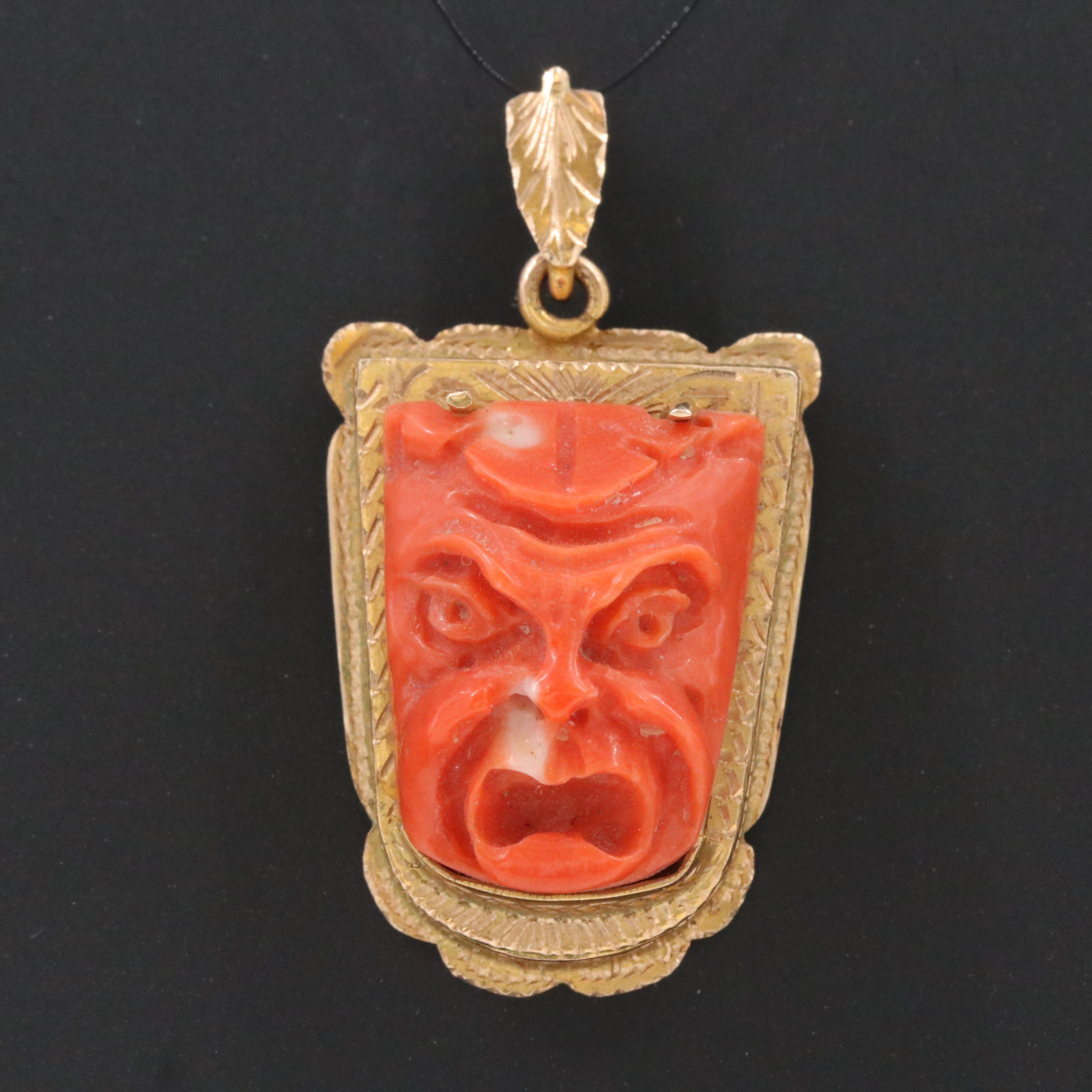 Vintage 10K Carved Coral Mask Pendant