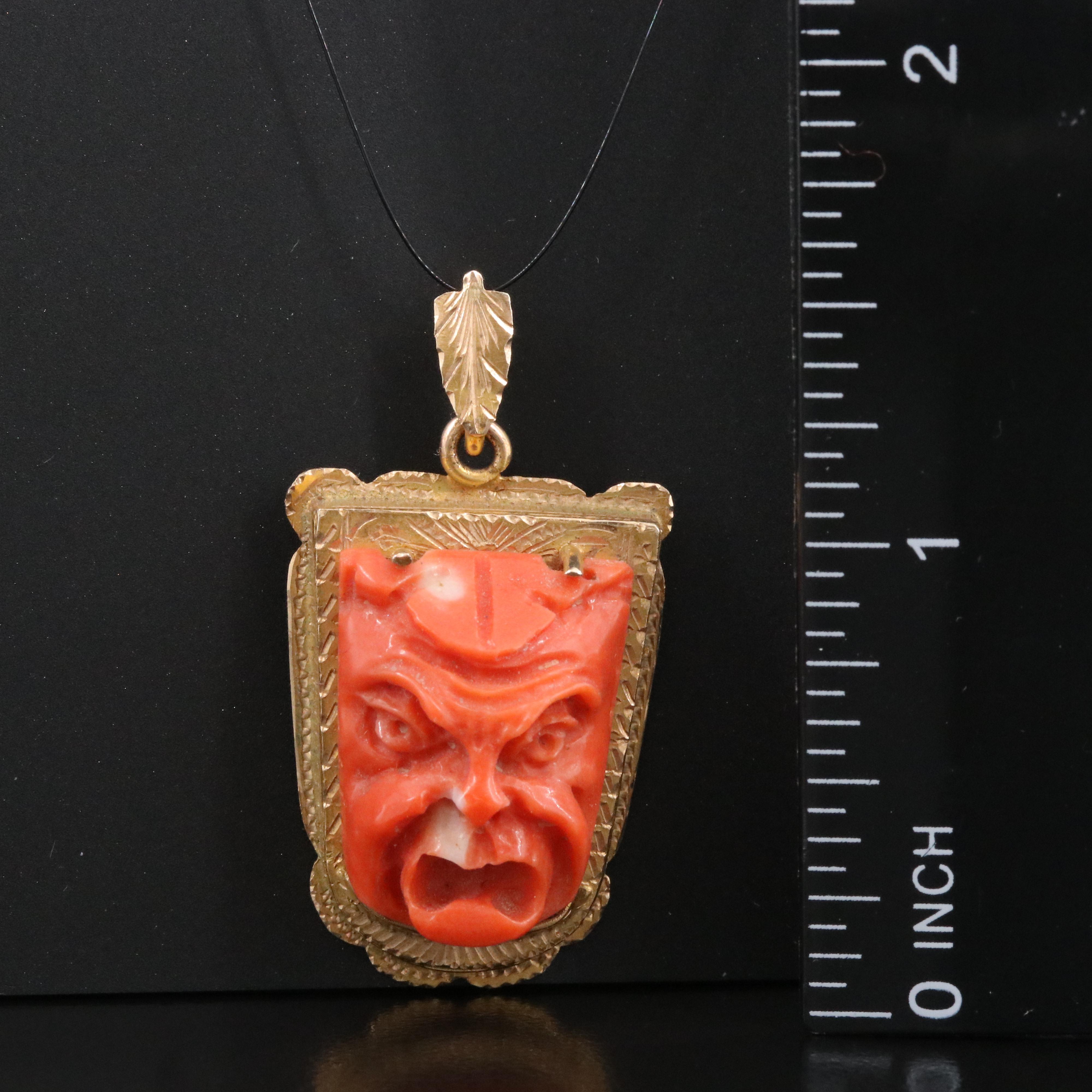 Vintage 10K Carved Coral Mask Pendant