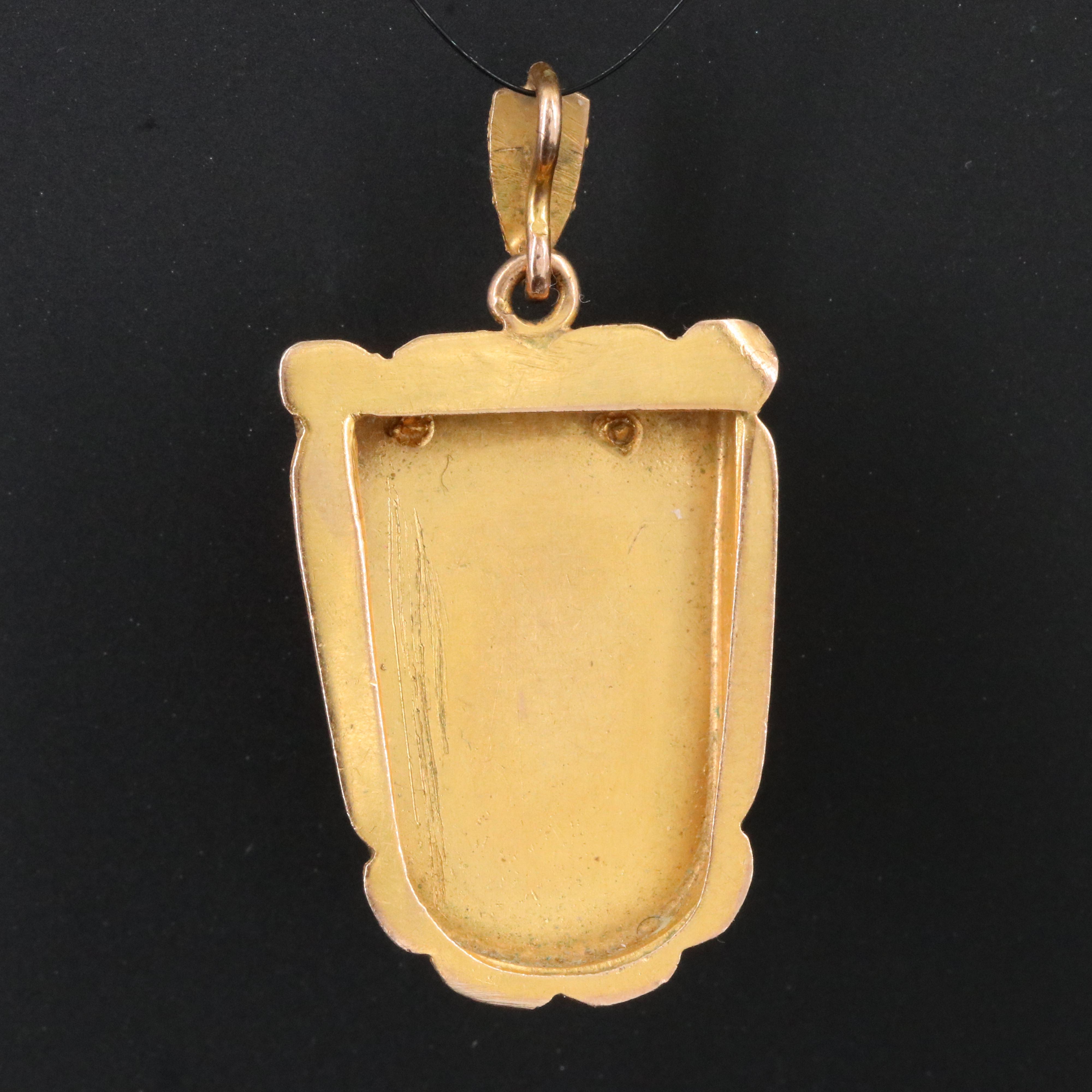 Vintage 10K Carved Coral Mask Pendant