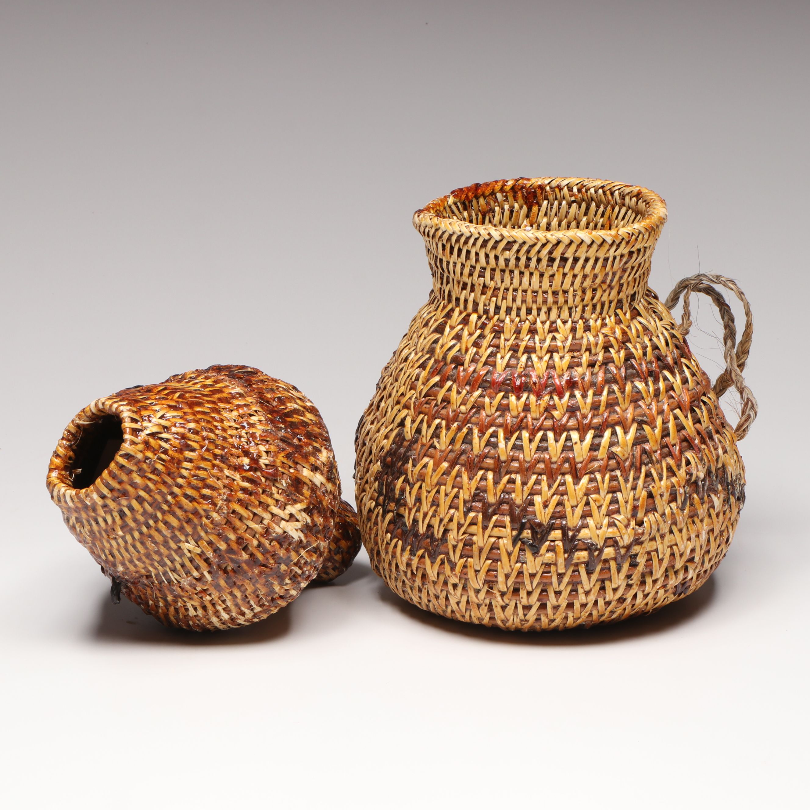 Etta Rock with Other Diné (Navajo) Sumac and Pine Pitch Vessels