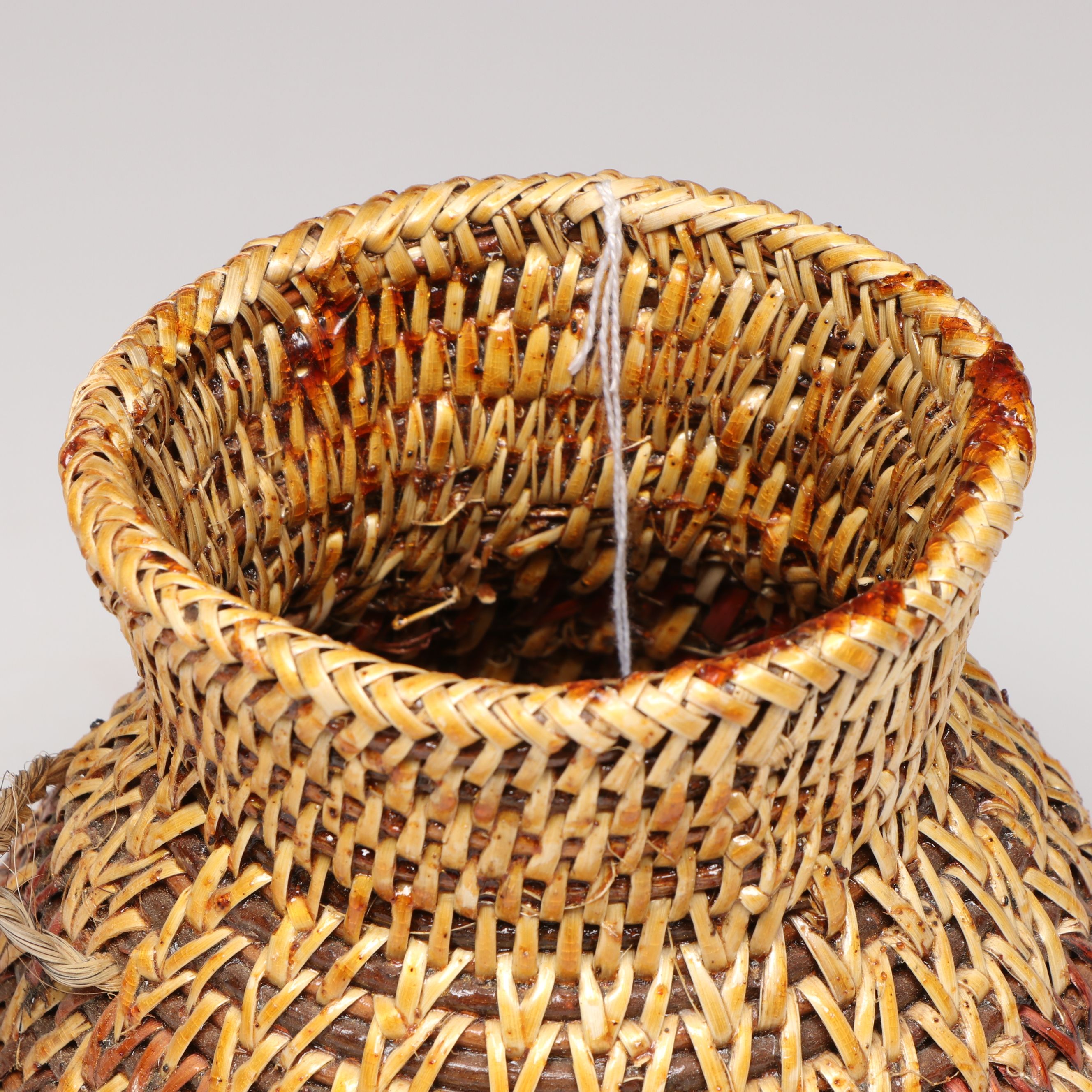 Etta Rock with Other Diné (Navajo) Sumac and Pine Pitch Vessels