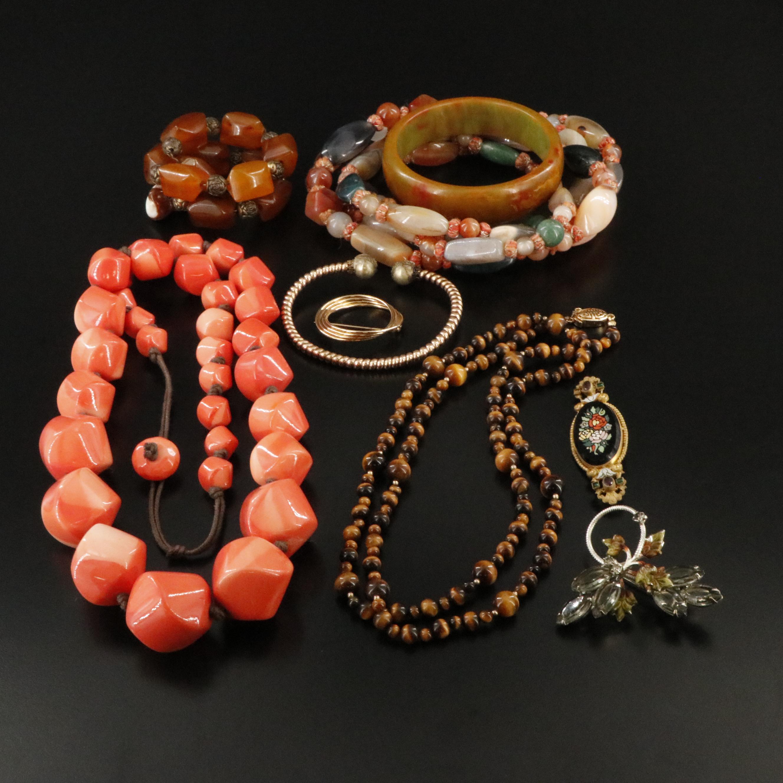 Bakelite, Agate and Tiger's Eye Featured in Jewelry Collection