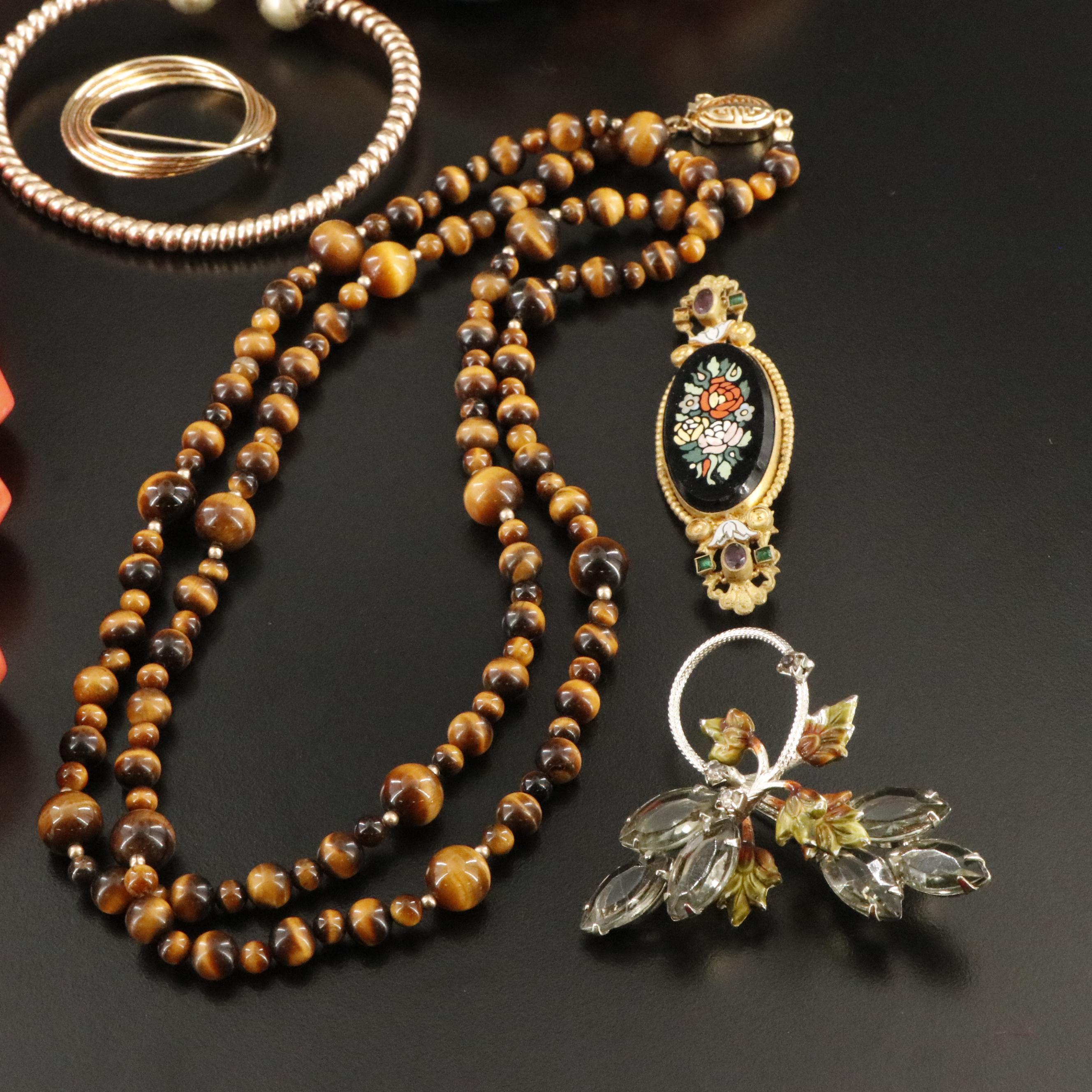 Bakelite, Agate and Tiger's Eye Featured in Jewelry Collection