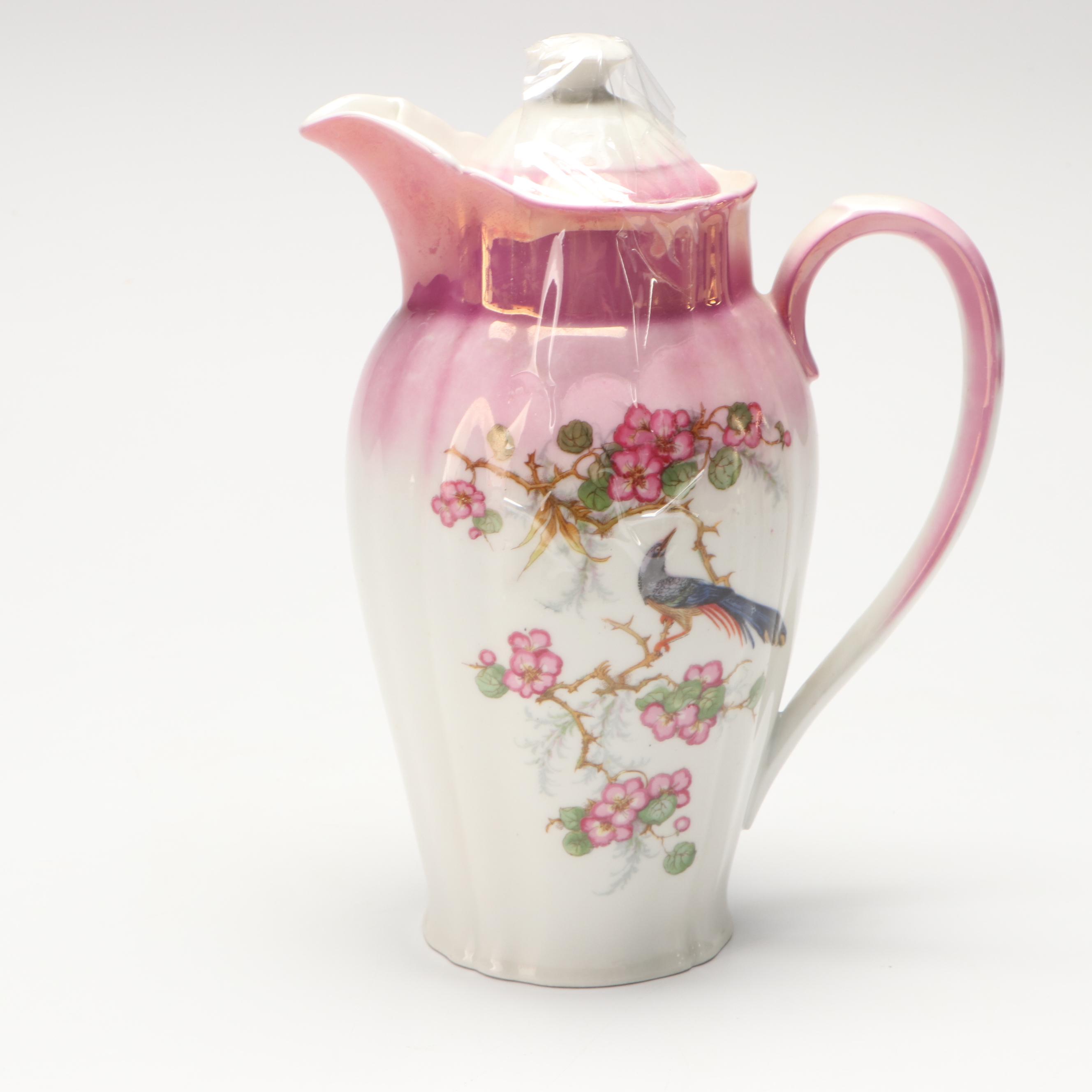 Weller and Other Pitchers, German Porcelain Teapot, and Veramic Vase
