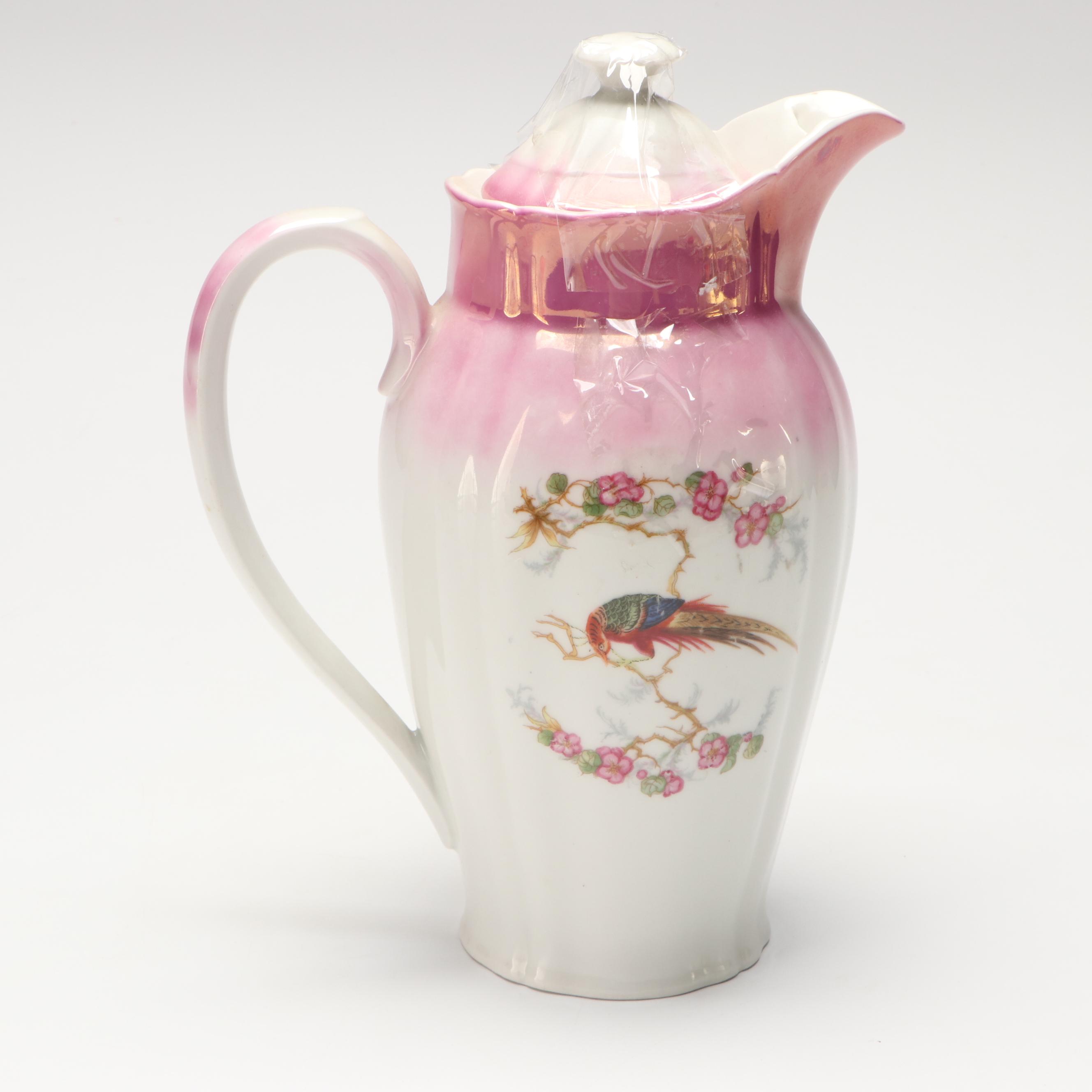 Weller and Other Pitchers, German Porcelain Teapot, and Veramic Vase