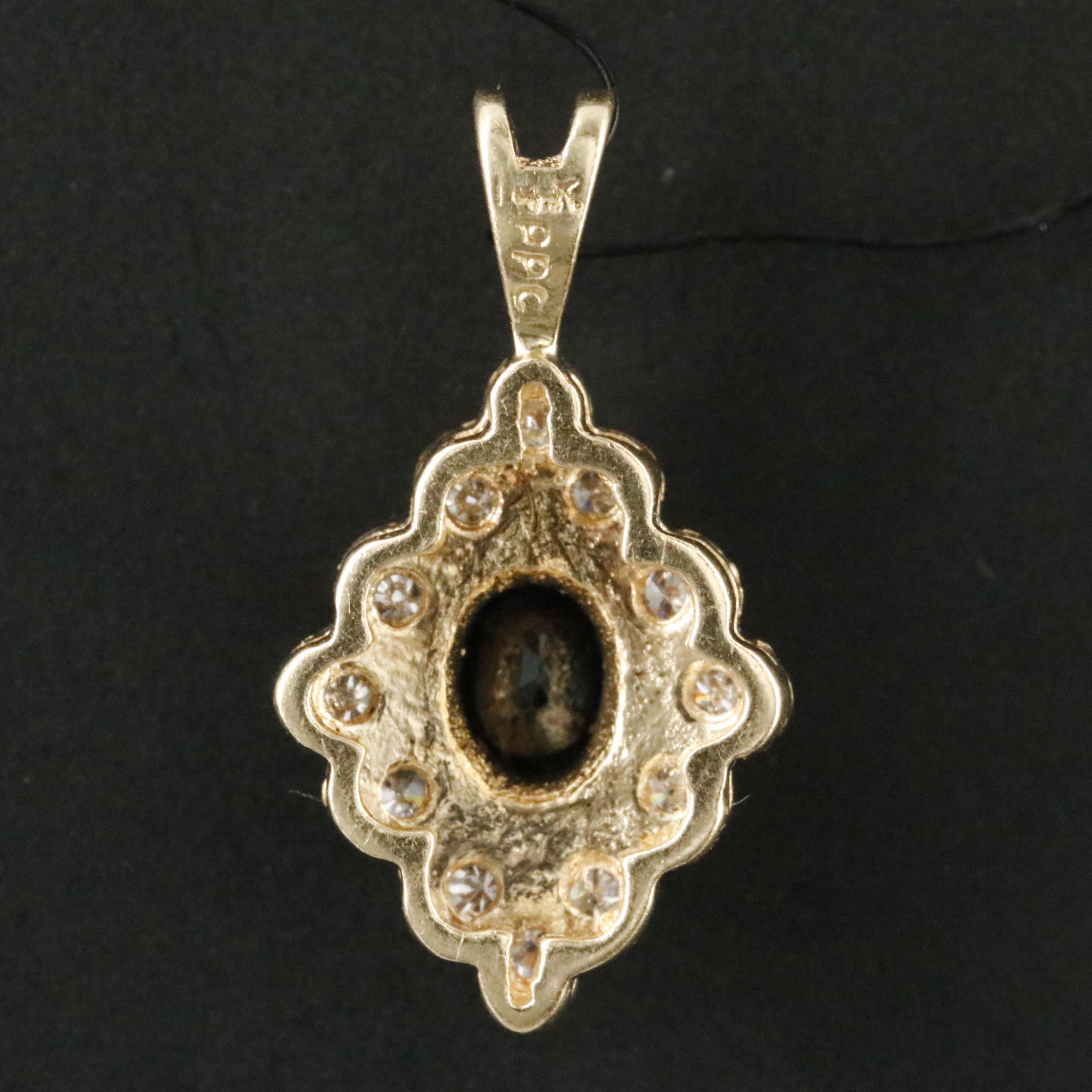 14K Sapphire and Diamond Halo Pendant