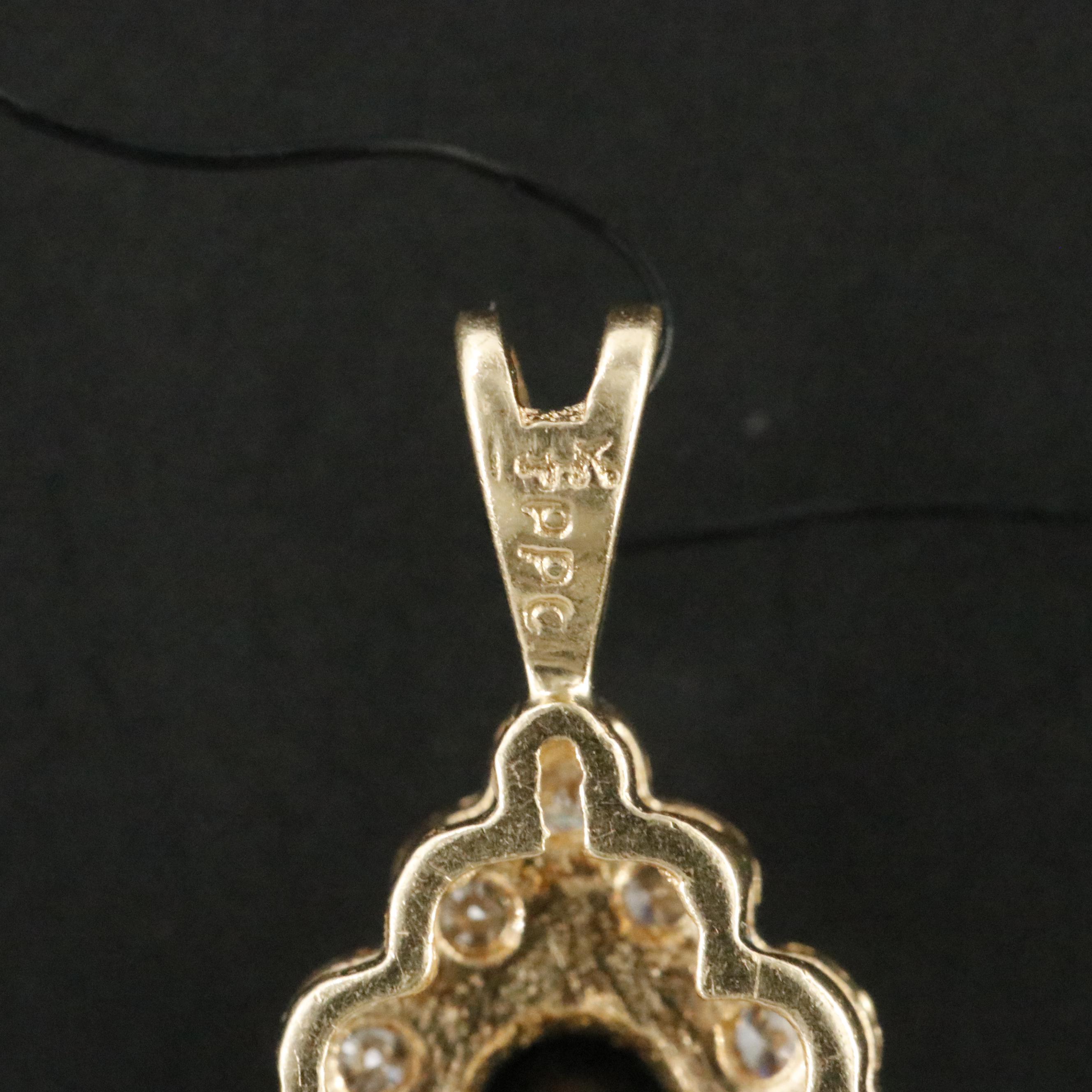 14K Sapphire and Diamond Halo Pendant