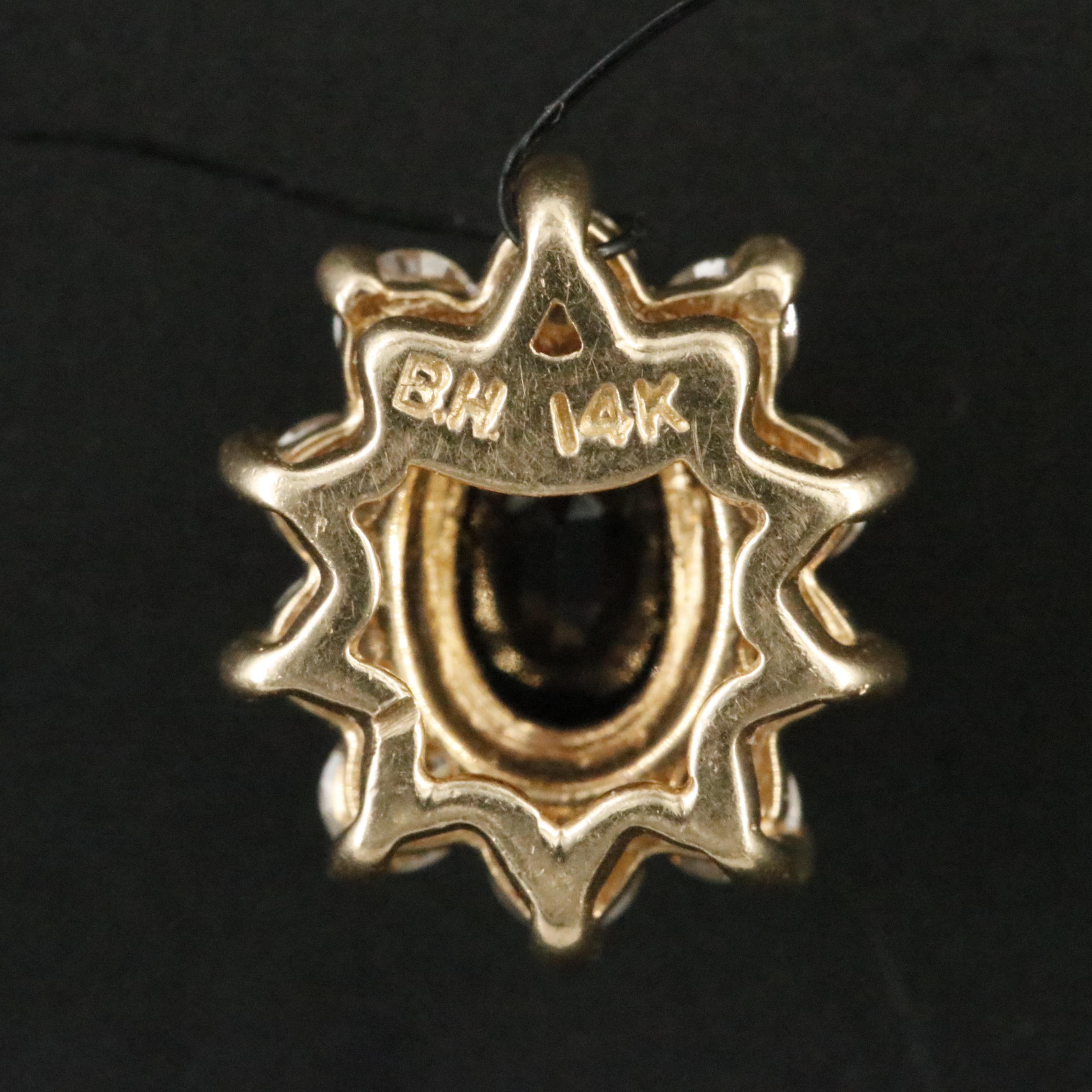 14K Sapphire and Diamond Halo Pendant