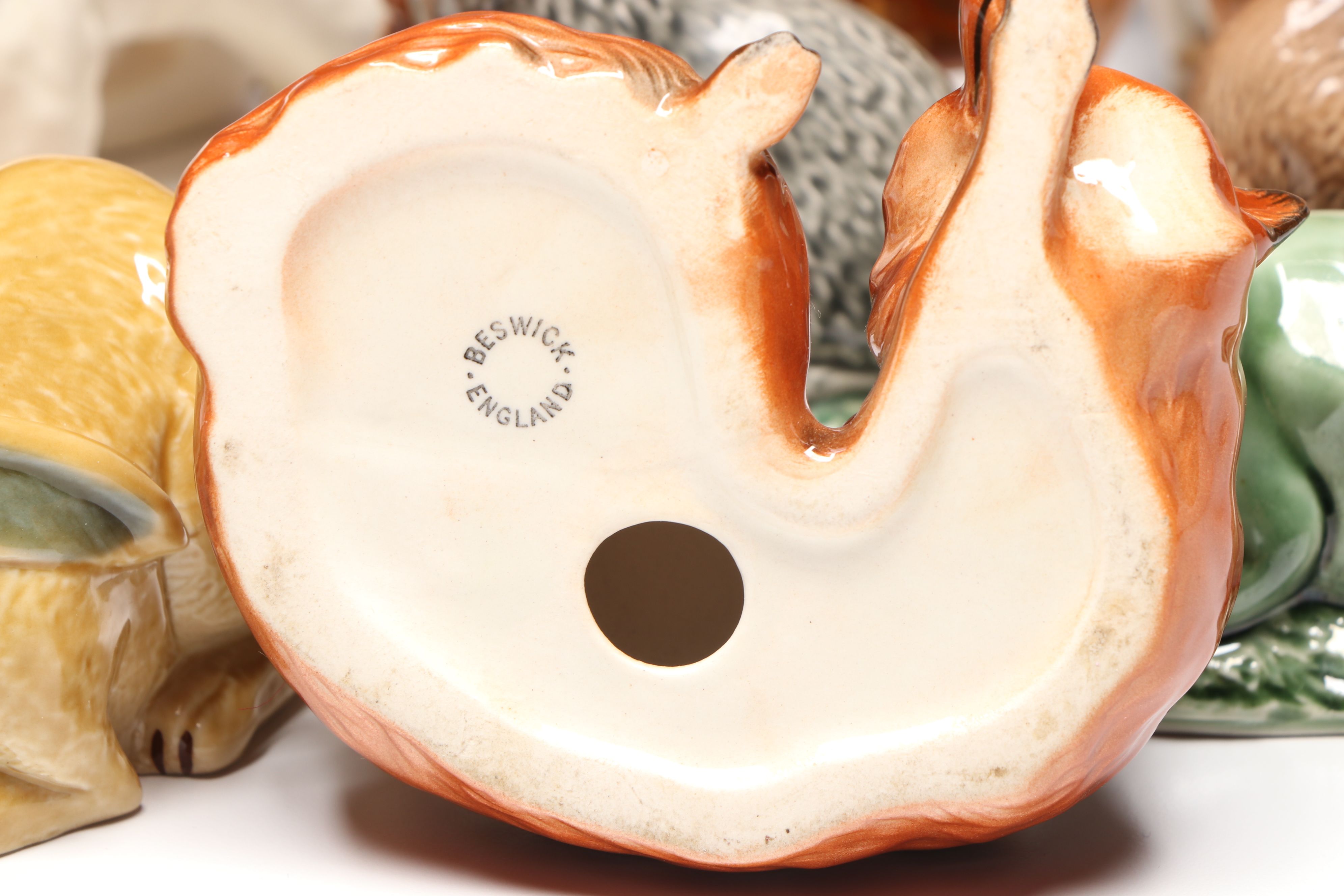 Lomonosov Porcelain Raccoon with Beswick Decanters and More Figurines