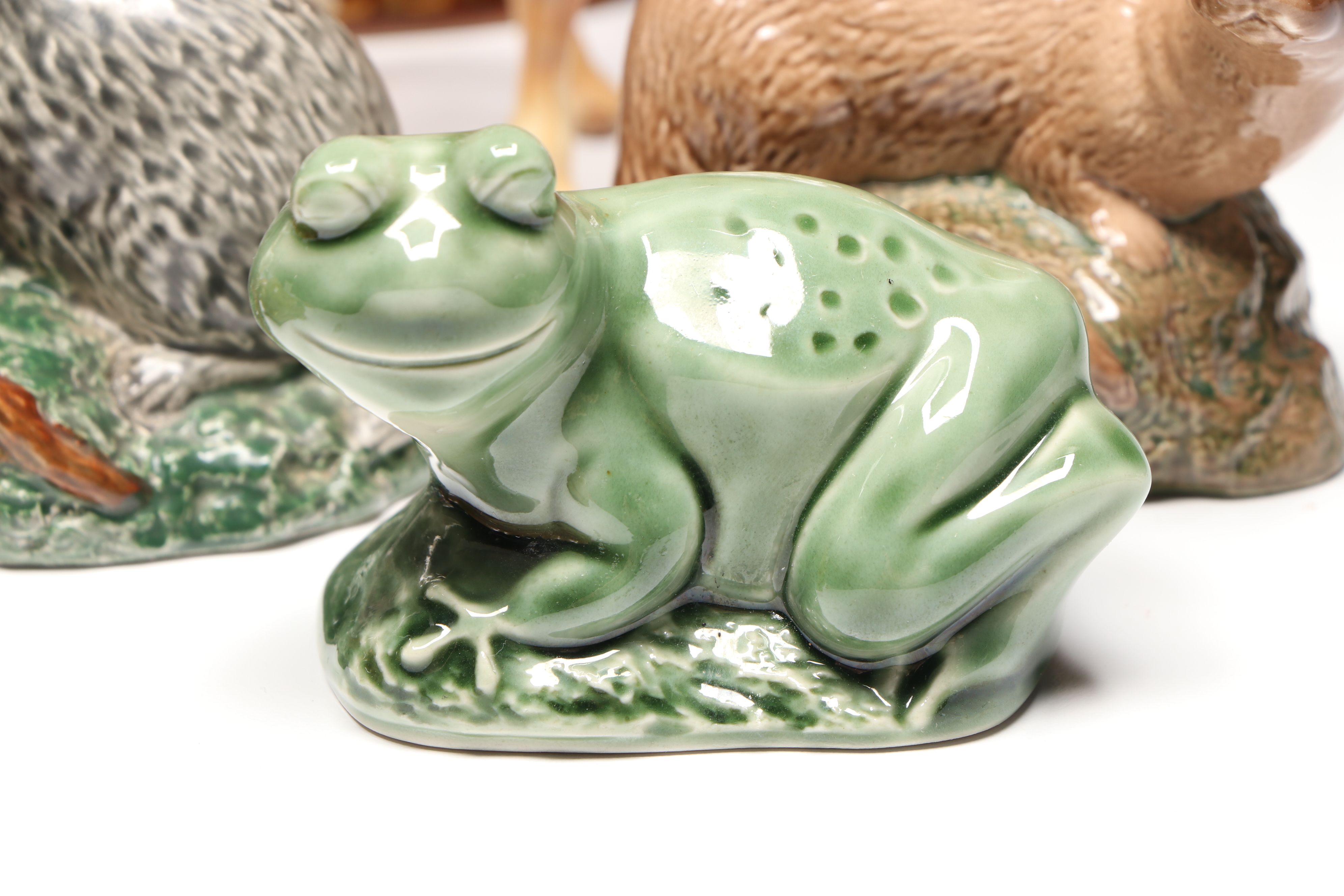 Lomonosov Porcelain Raccoon with Beswick Decanters and More Figurines