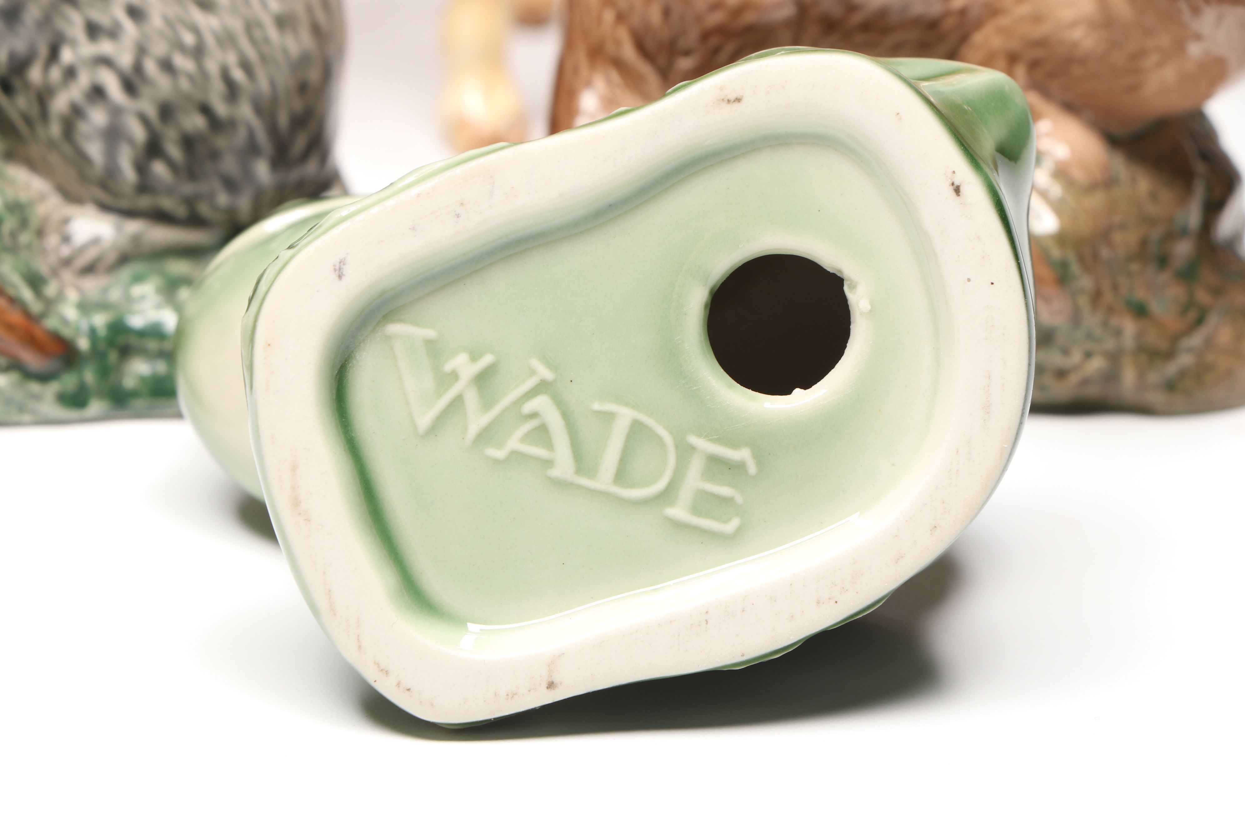 Lomonosov Porcelain Raccoon with Beswick Decanters and More Figurines