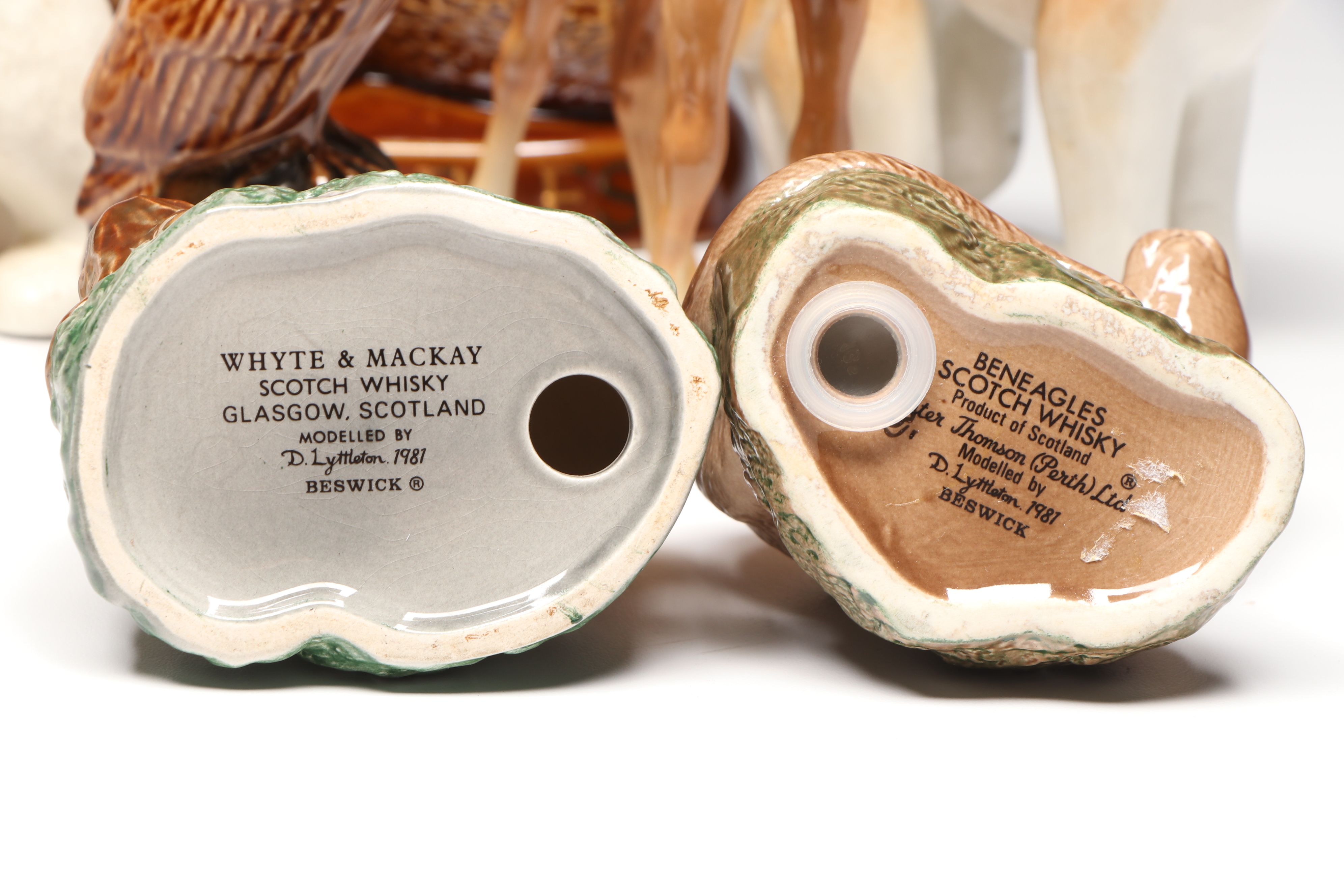 Lomonosov Porcelain Raccoon with Beswick Decanters and More Figurines