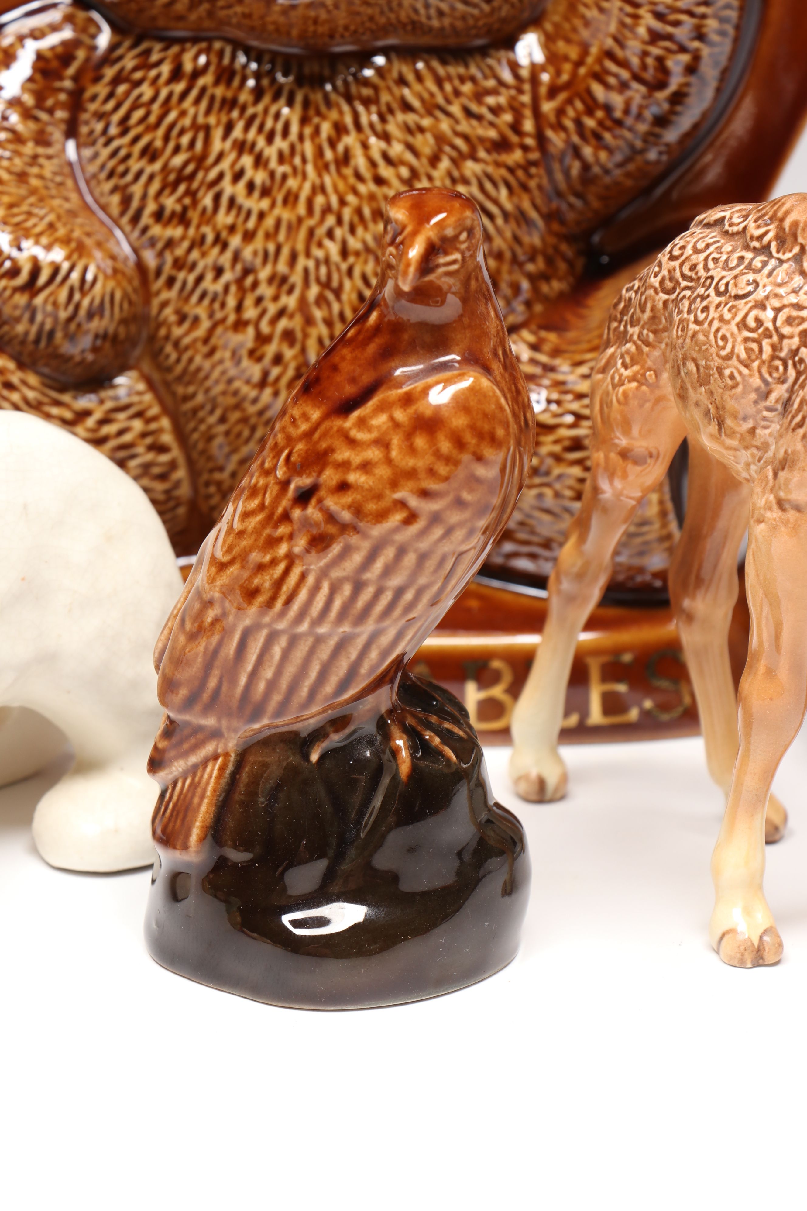 Lomonosov Porcelain Raccoon with Beswick Decanters and More Figurines