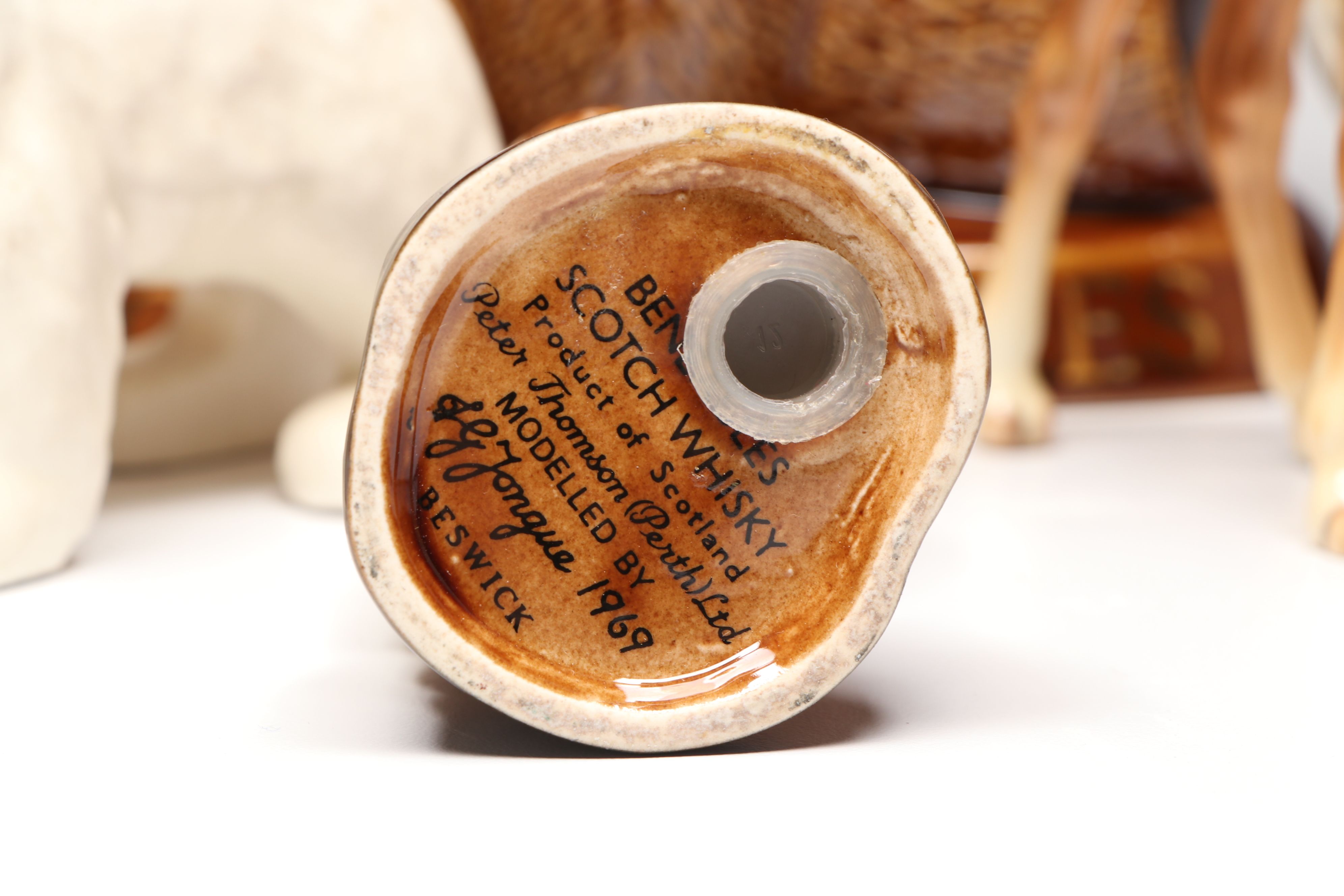 Lomonosov Porcelain Raccoon with Beswick Decanters and More Figurines