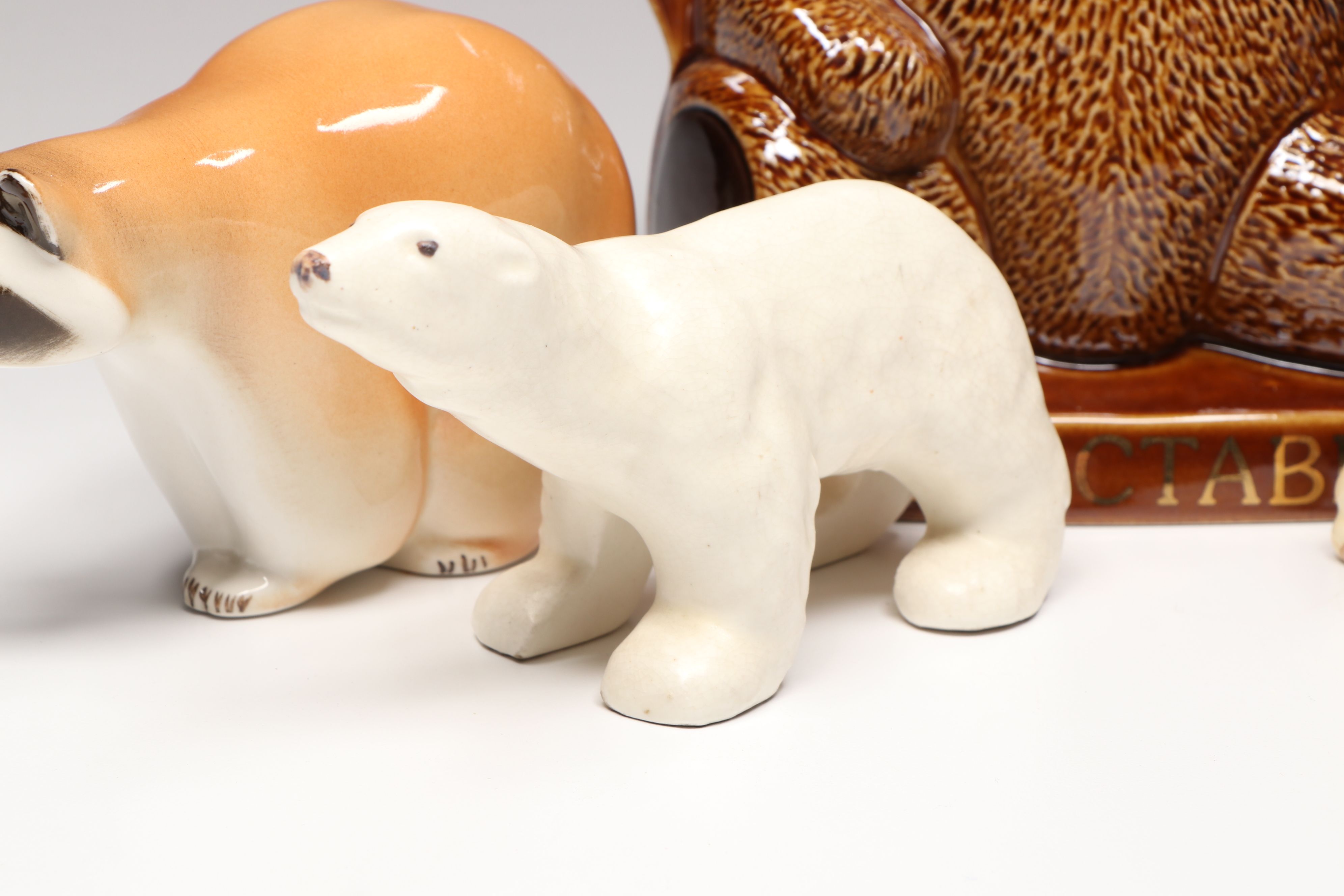 Lomonosov Porcelain Raccoon with Beswick Decanters and More Figurines