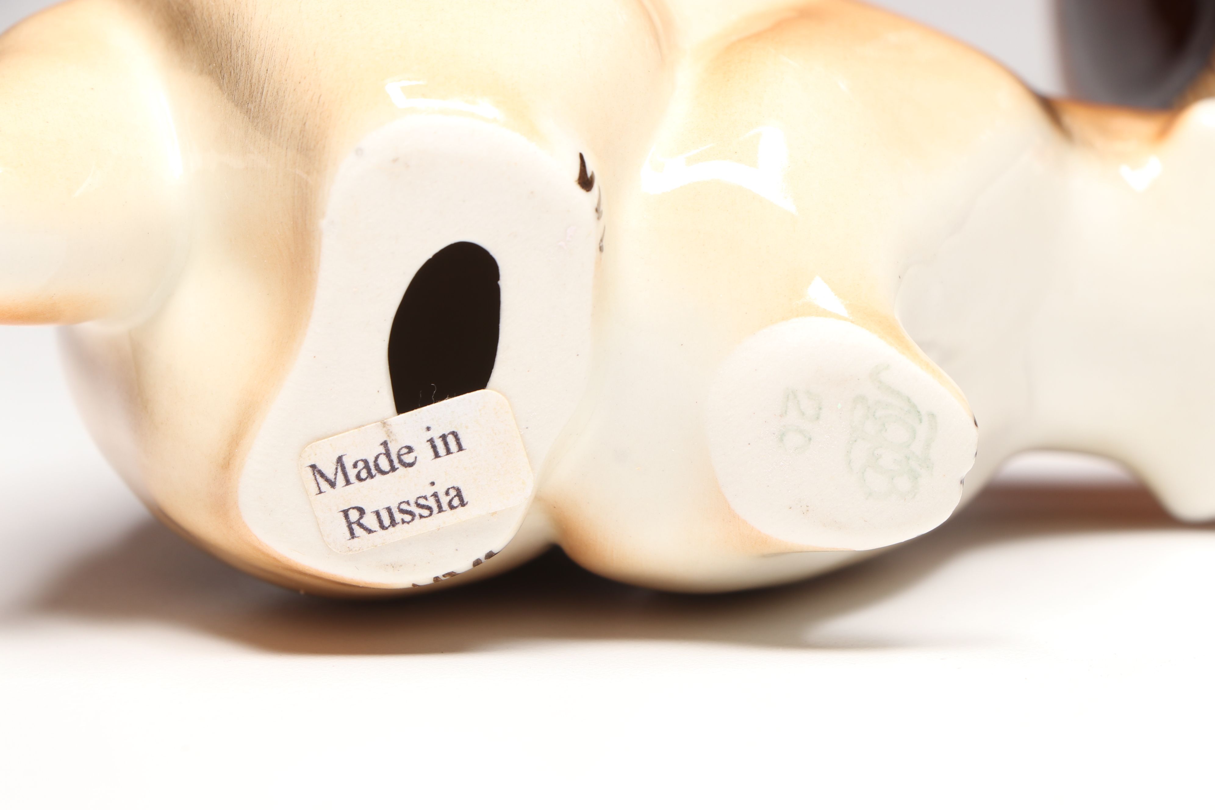 Lomonosov Porcelain Raccoon with Beswick Decanters and More Figurines