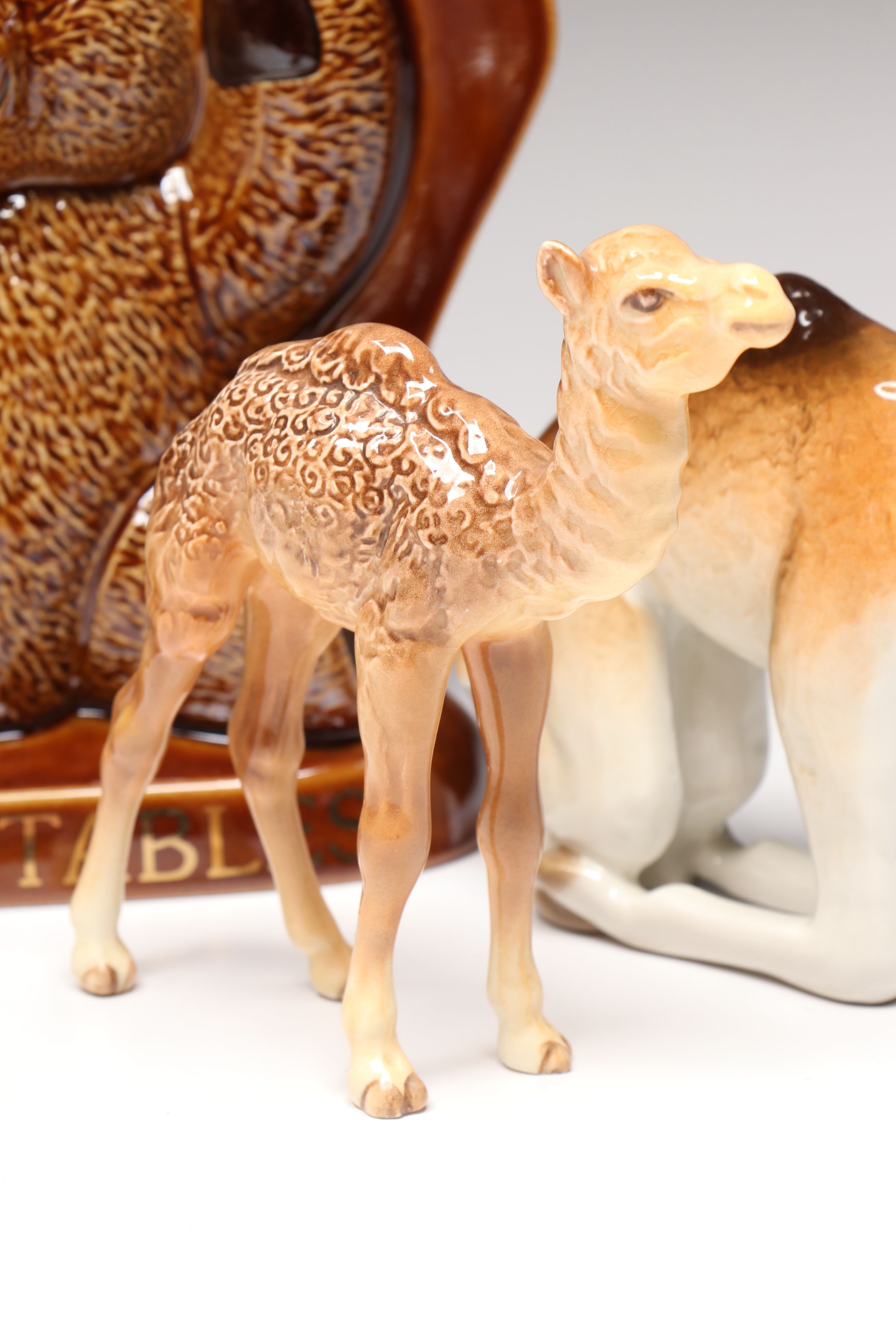 Lomonosov Porcelain Raccoon with Beswick Decanters and More Figurines