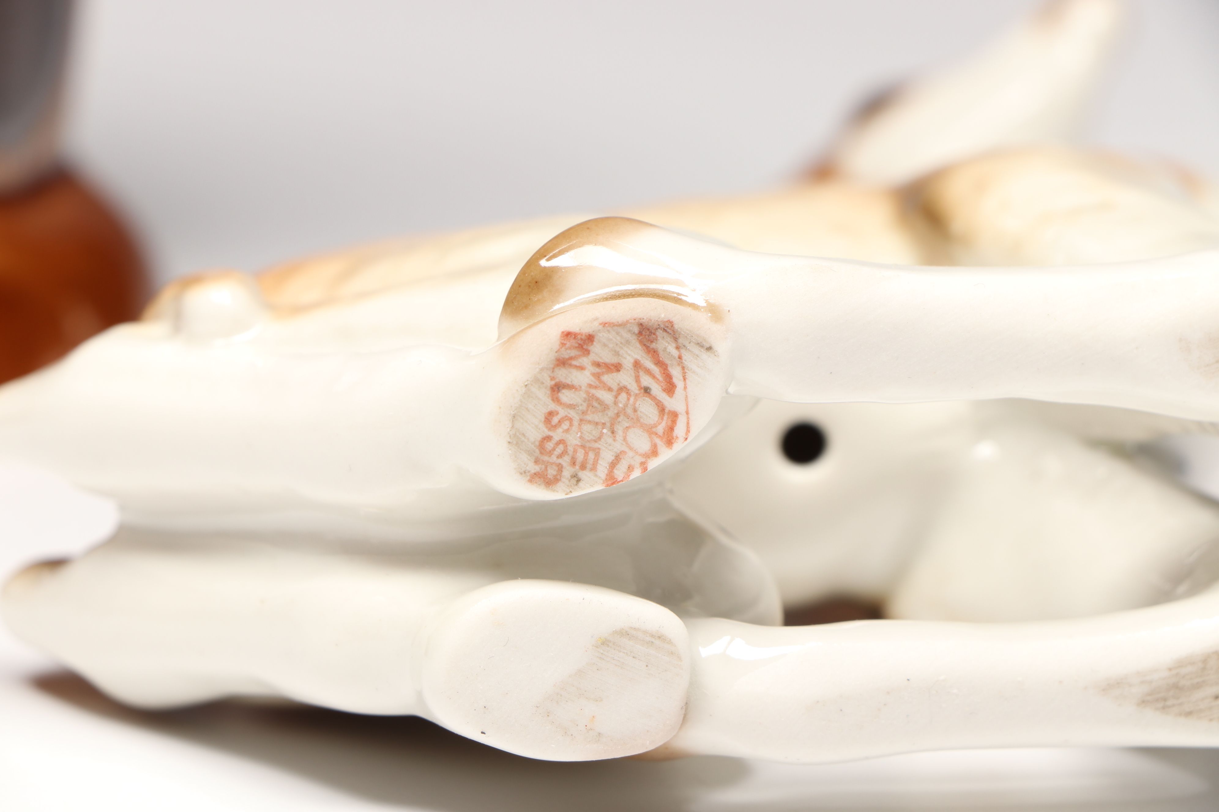 Lomonosov Porcelain Raccoon with Beswick Decanters and More Figurines