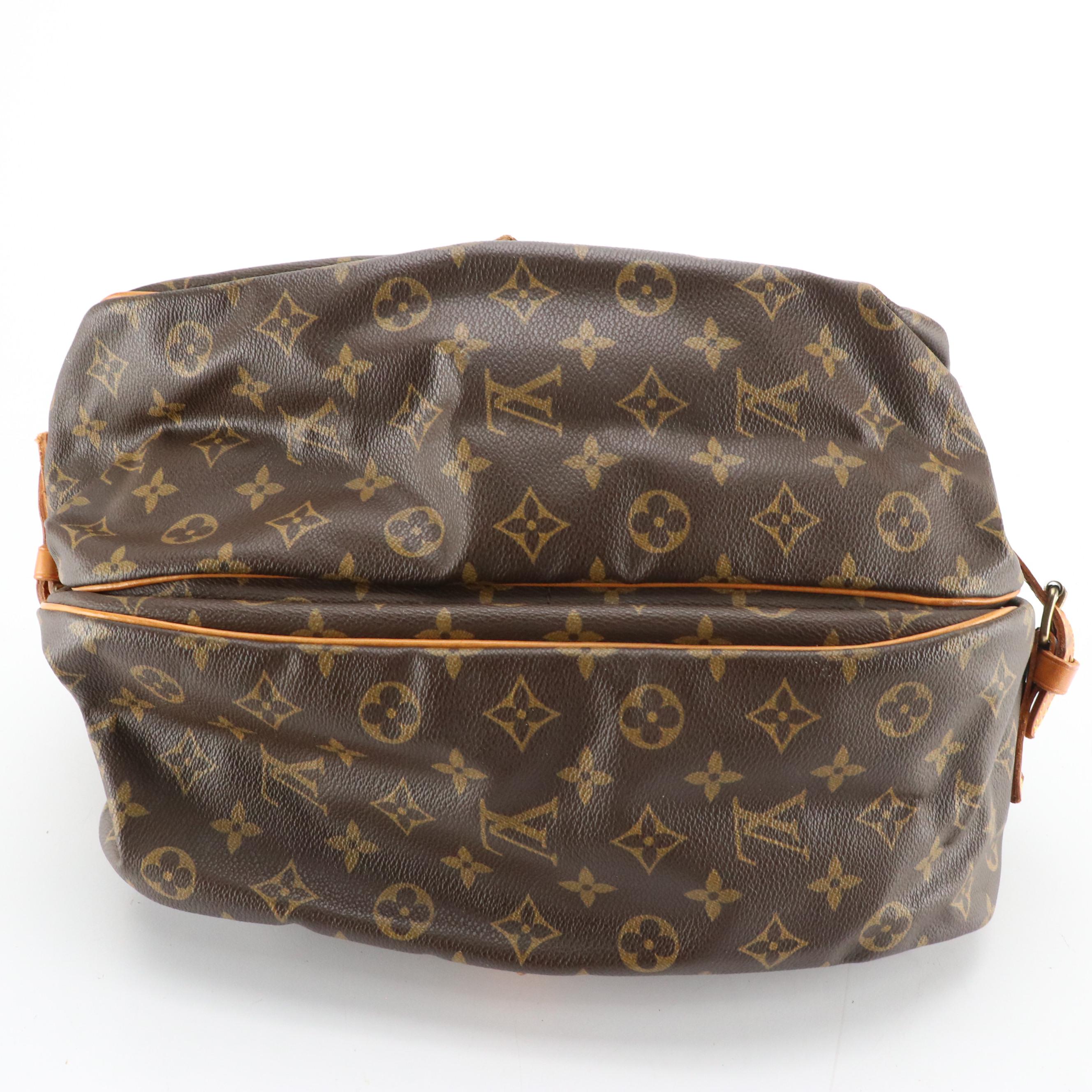 Louis Vuitton Saumur 35 in Monogram Canvas and Vachetta Leather