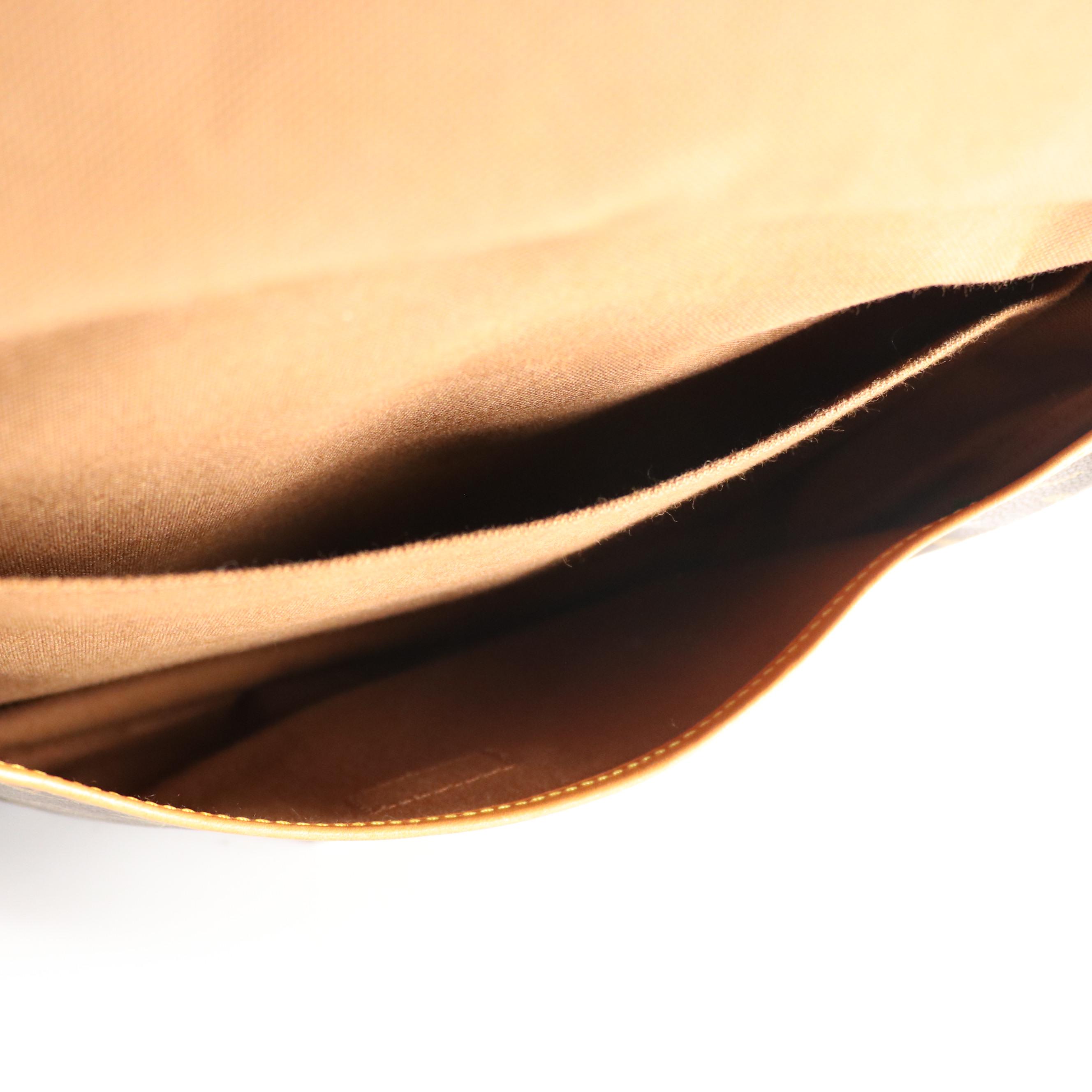 Louis Vuitton Saumur 35 in Monogram Canvas and Vachetta Leather