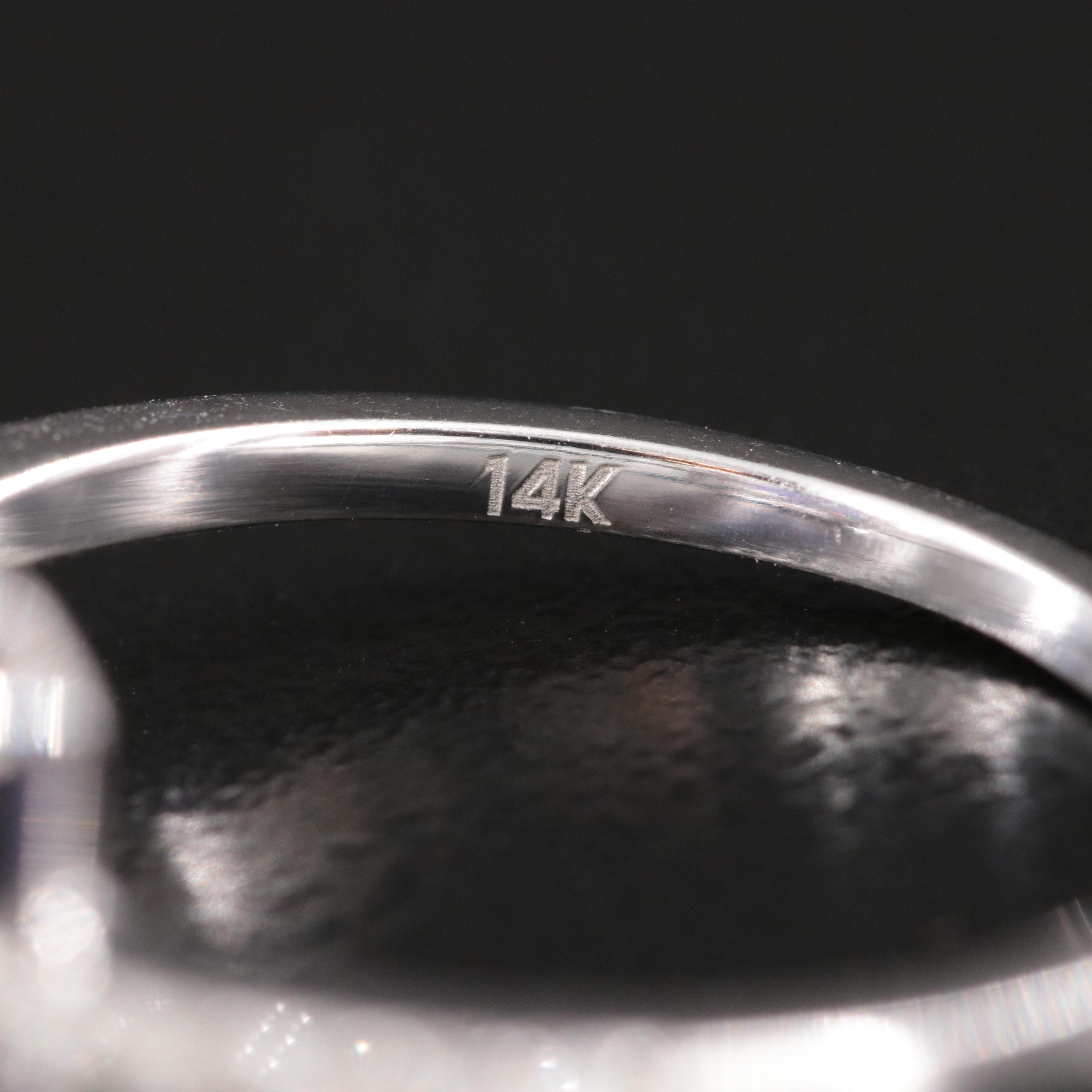 14K Tanzanite and Diamond Halo Ring