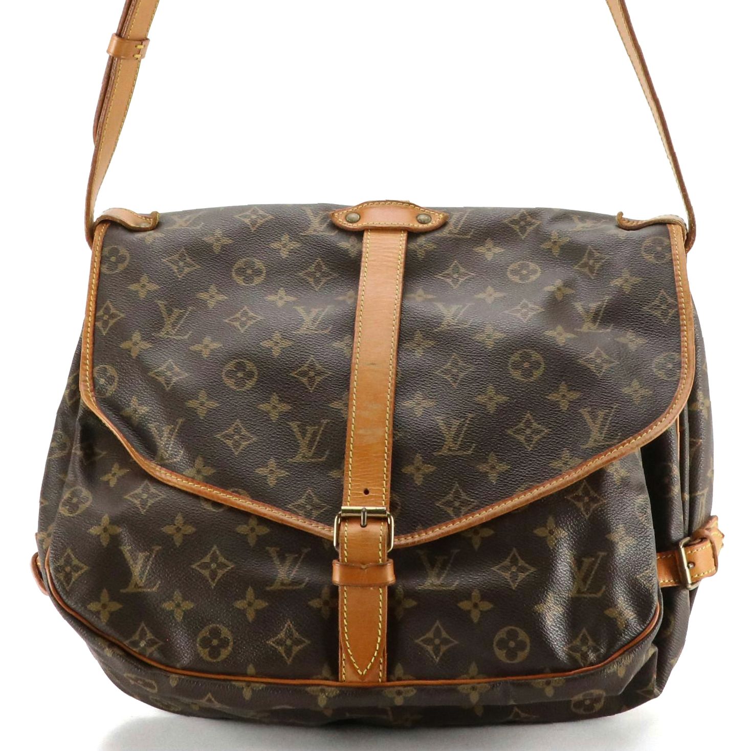 Louis Vuitton Saumur 35 in Monogram Canvas and Vachetta Leather