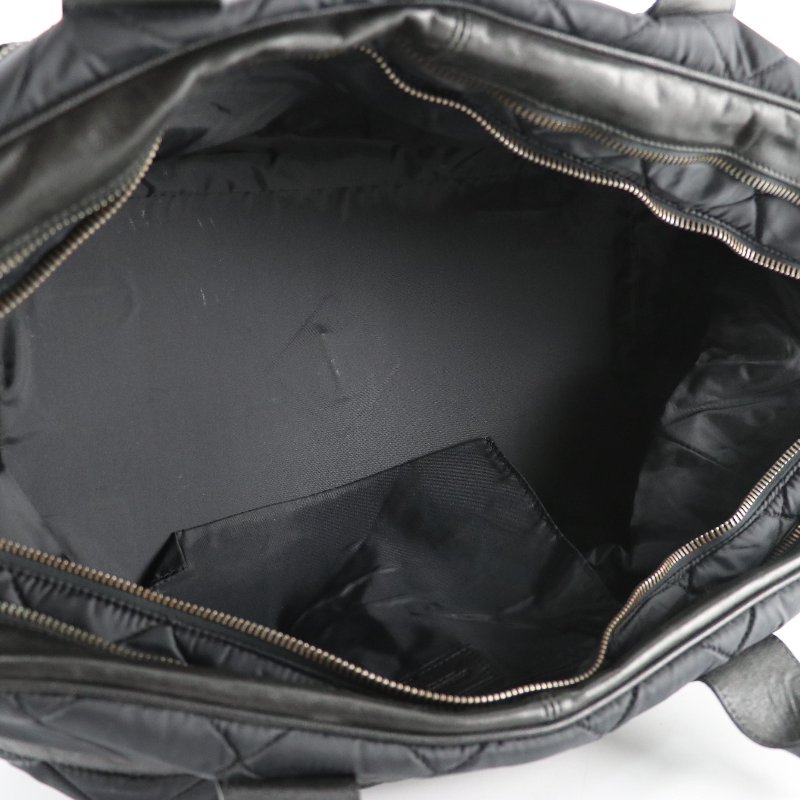 Dolce & Gabbana Quilted Nylon Travel Bag with Leather Trim and Embossed Accents