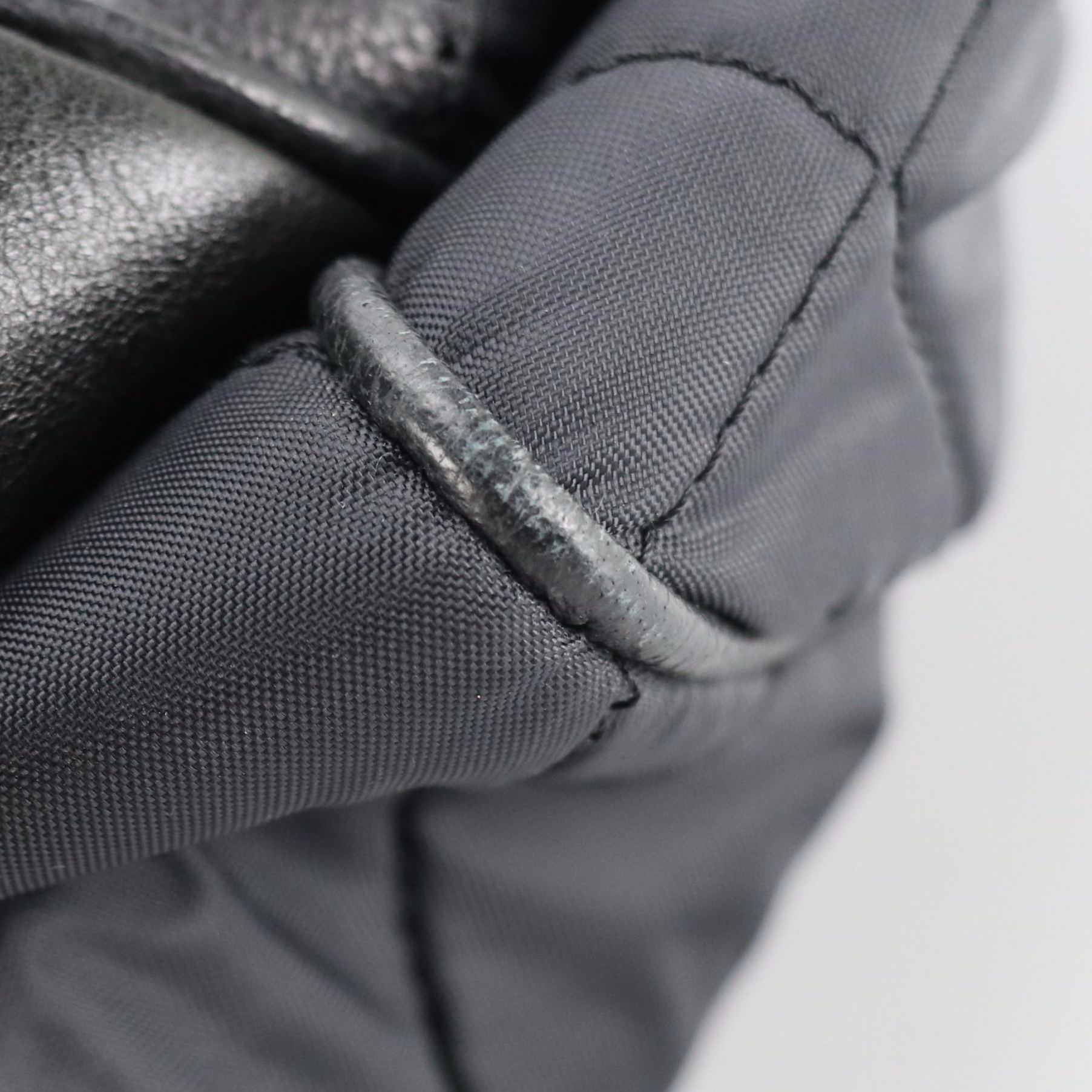 Dolce & Gabbana Quilted Nylon Travel Bag with Leather Trim and Embossed Accents