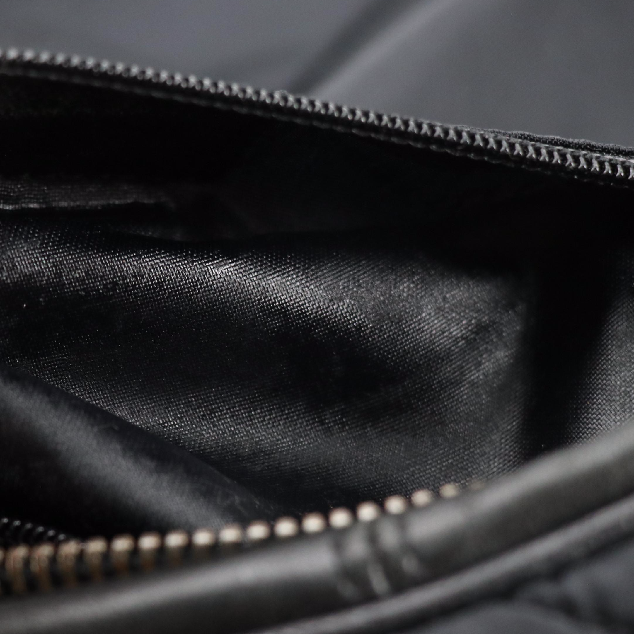 Dolce & Gabbana Quilted Nylon Travel Bag with Leather Trim and Embossed Accents