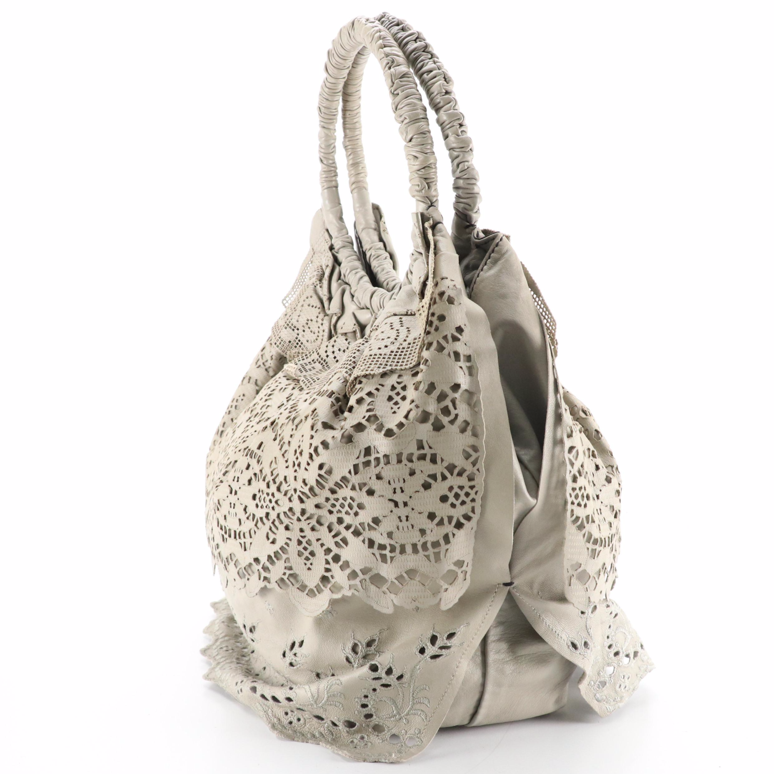 Valentino Garavani Laceland Hobo Bag in Ruffle Tiered Laser-Cut Leather