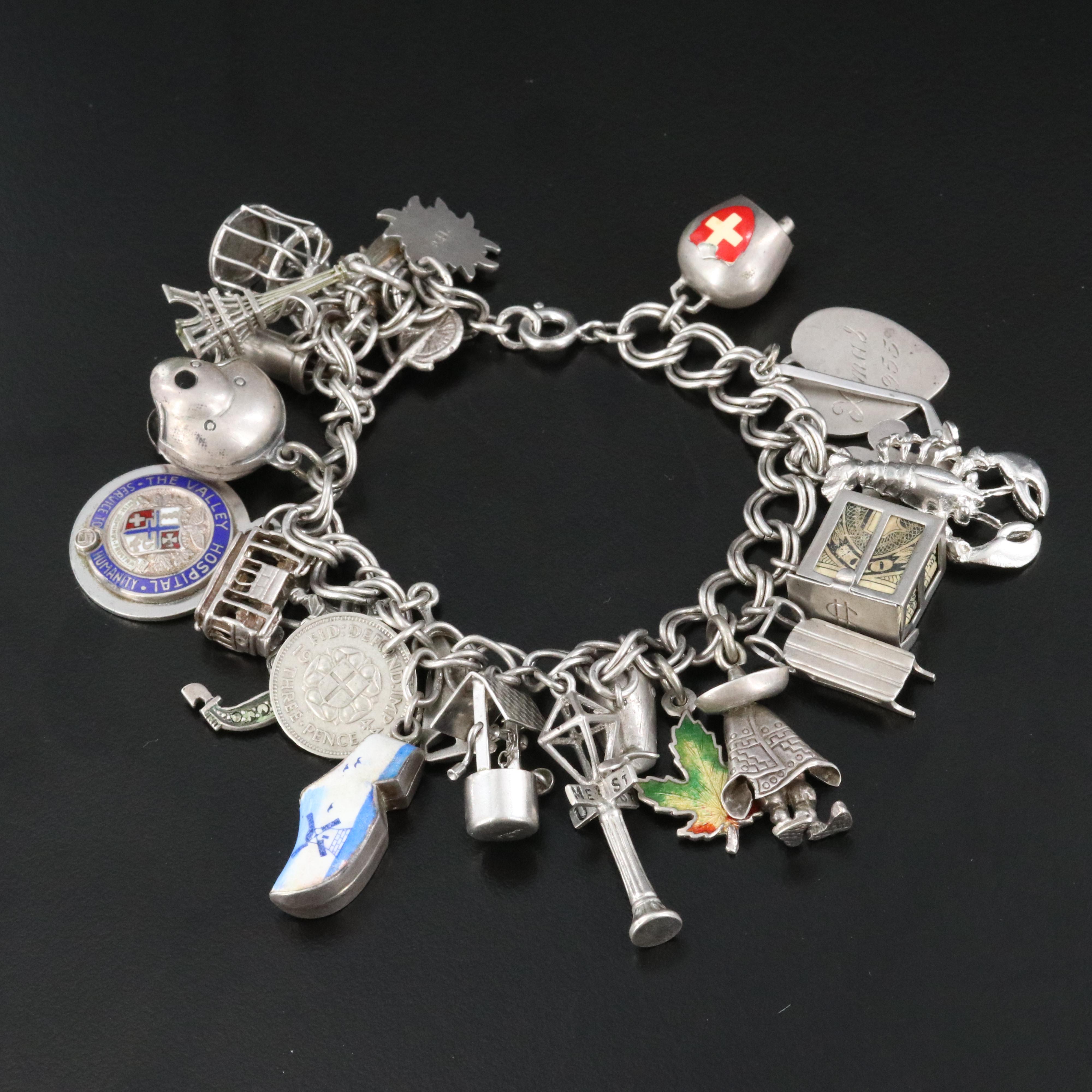 Vintage Sterling Charm Bracelet Including Articulated