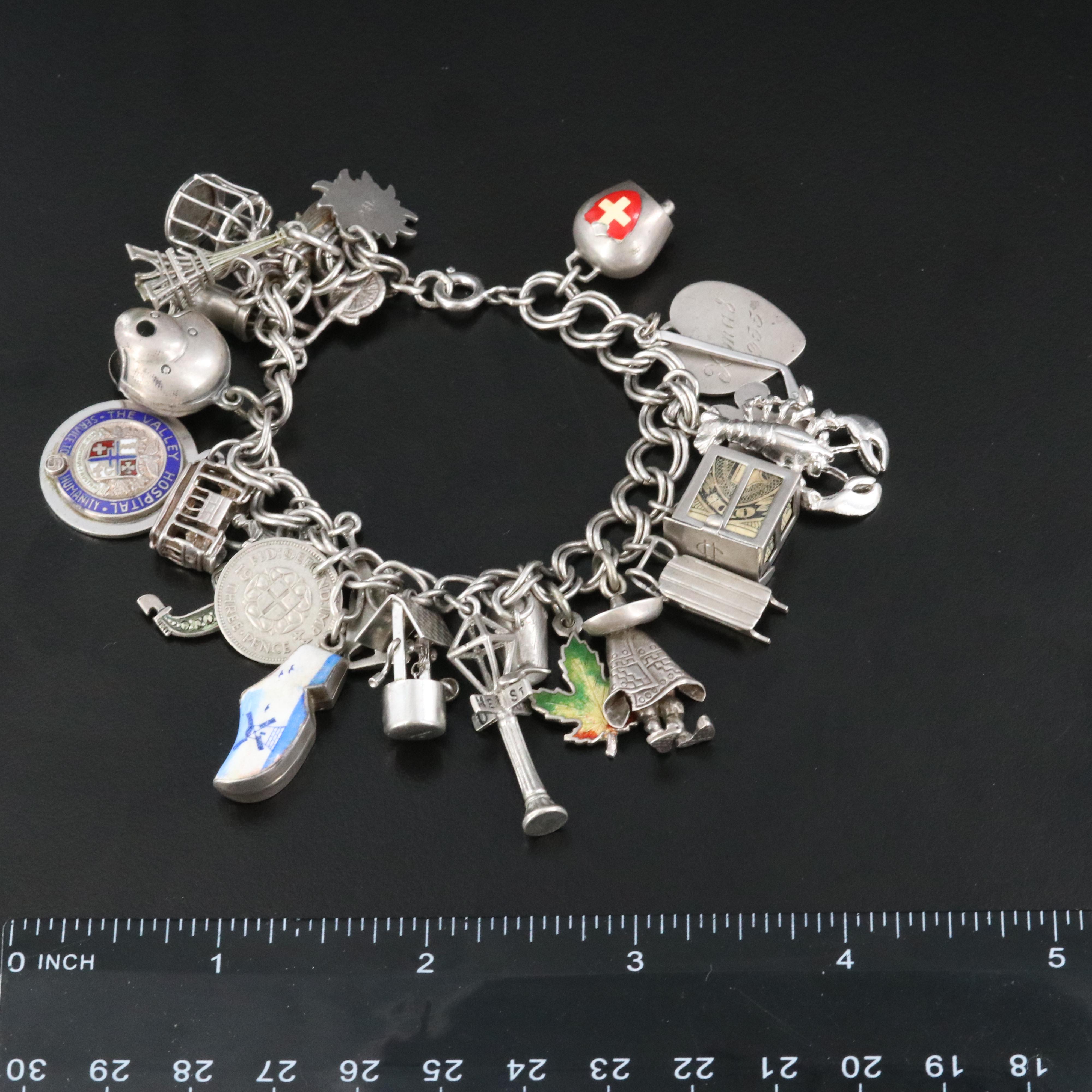 Vintage Sterling Charm Bracelet Including Articulated