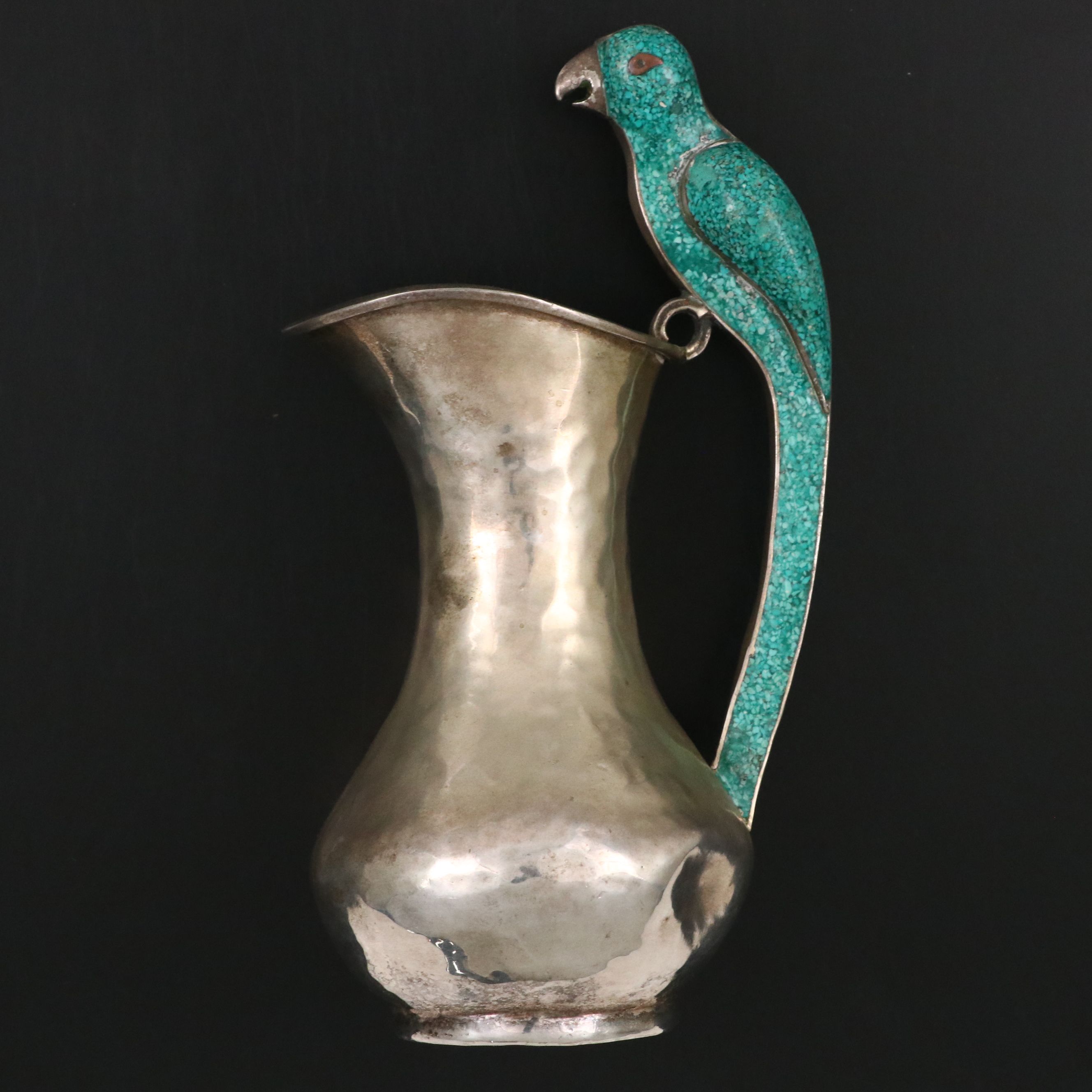Mexican Hammered Silver Plate Pitcher with Chipped Stone Parrot Handle
