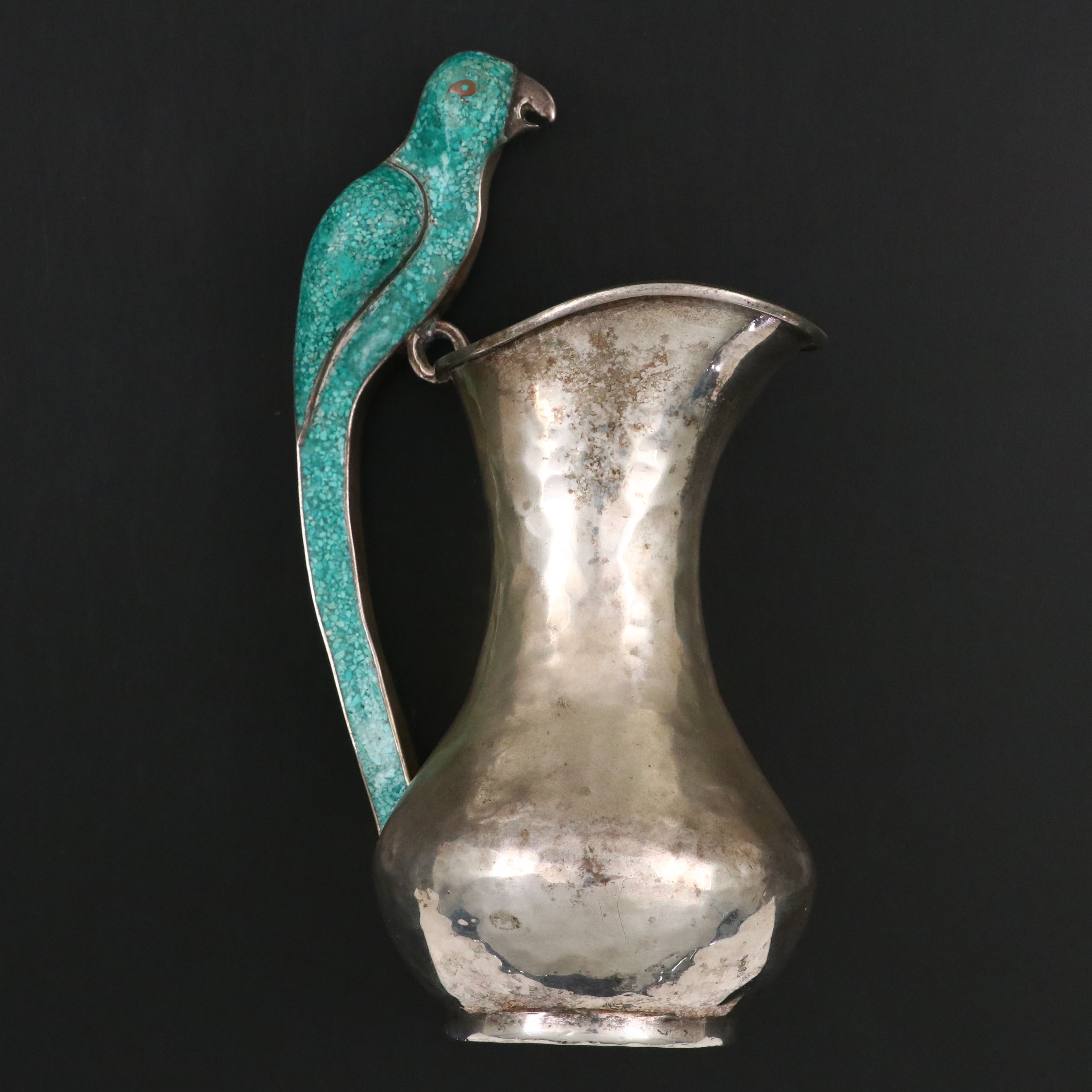 Mexican Hammered Silver Plate Pitcher with Chipped Stone Parrot Handle