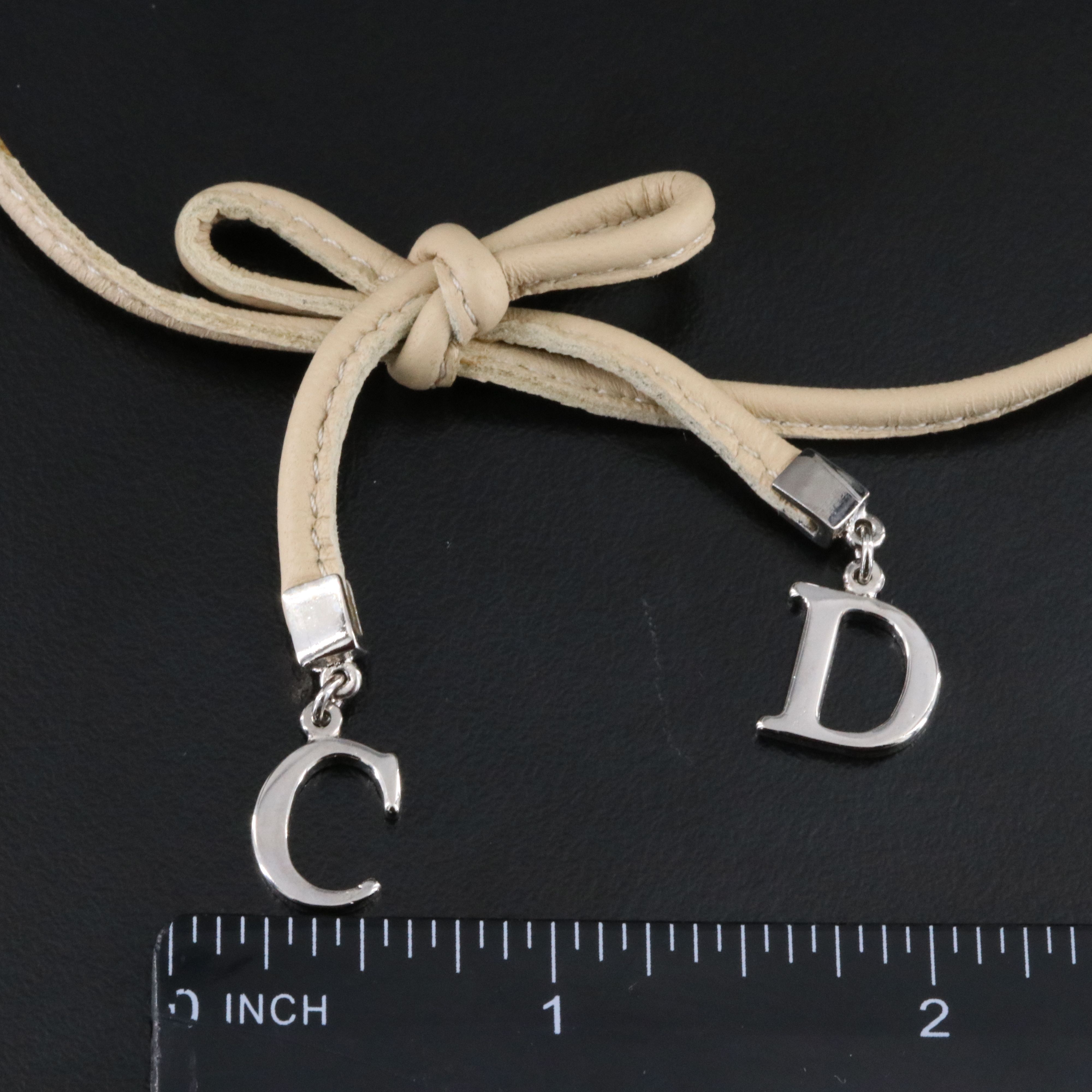 Christian Dior CD Faux Leather Bow Necklace