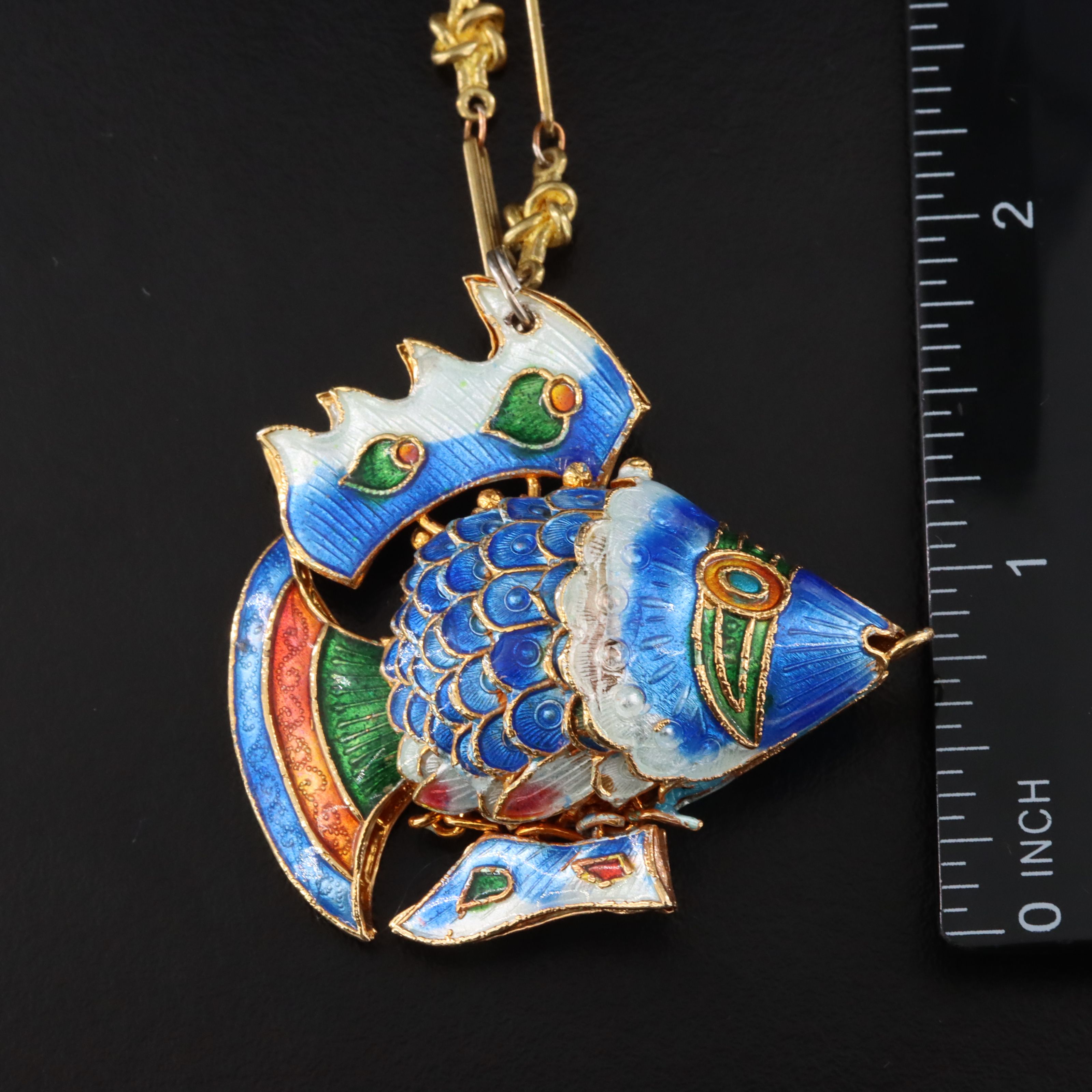 Articulated Fish Pendant Featured in Necklace Collection