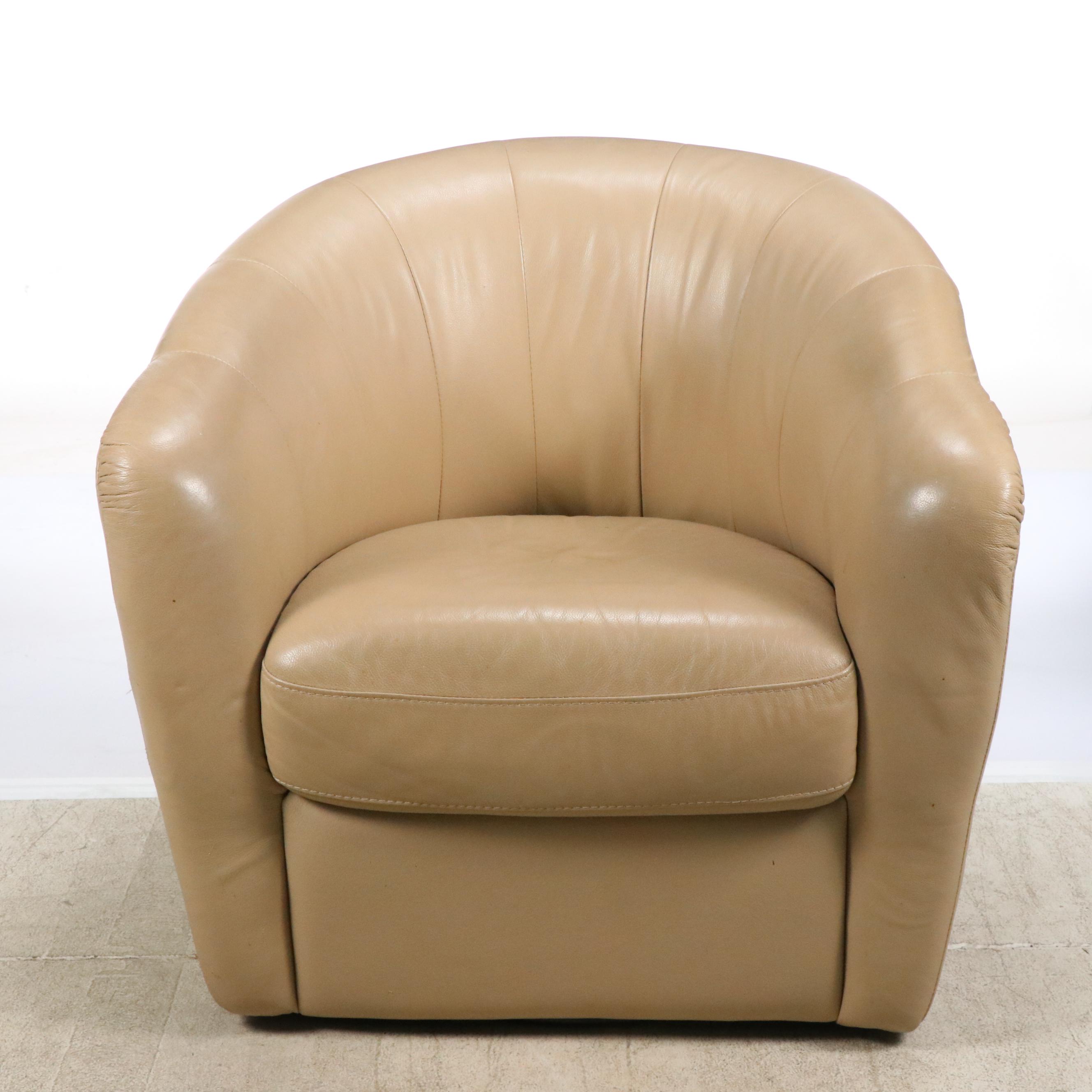 Tan Faux Leather Swivel Armchair