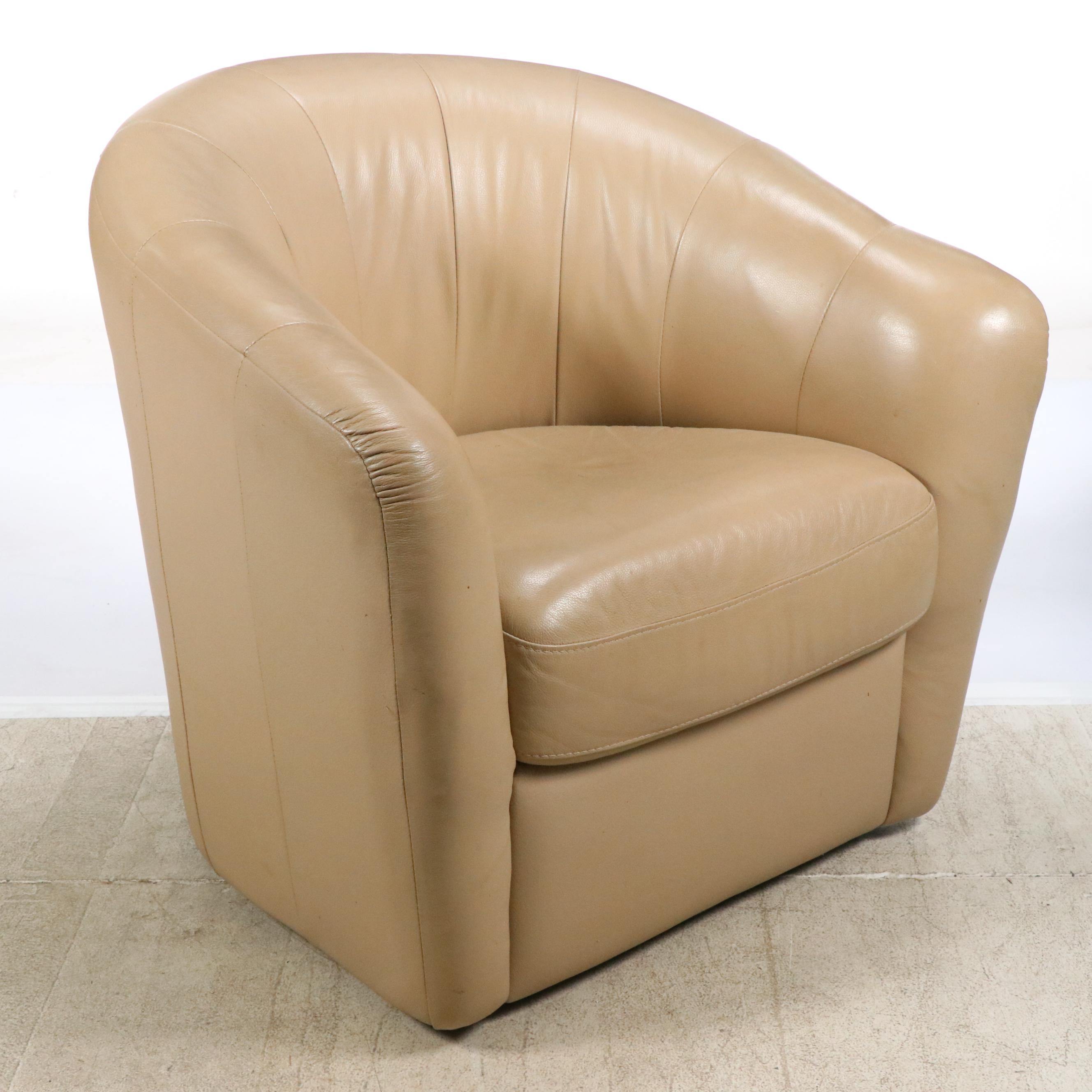 Tan Faux Leather Swivel Armchair