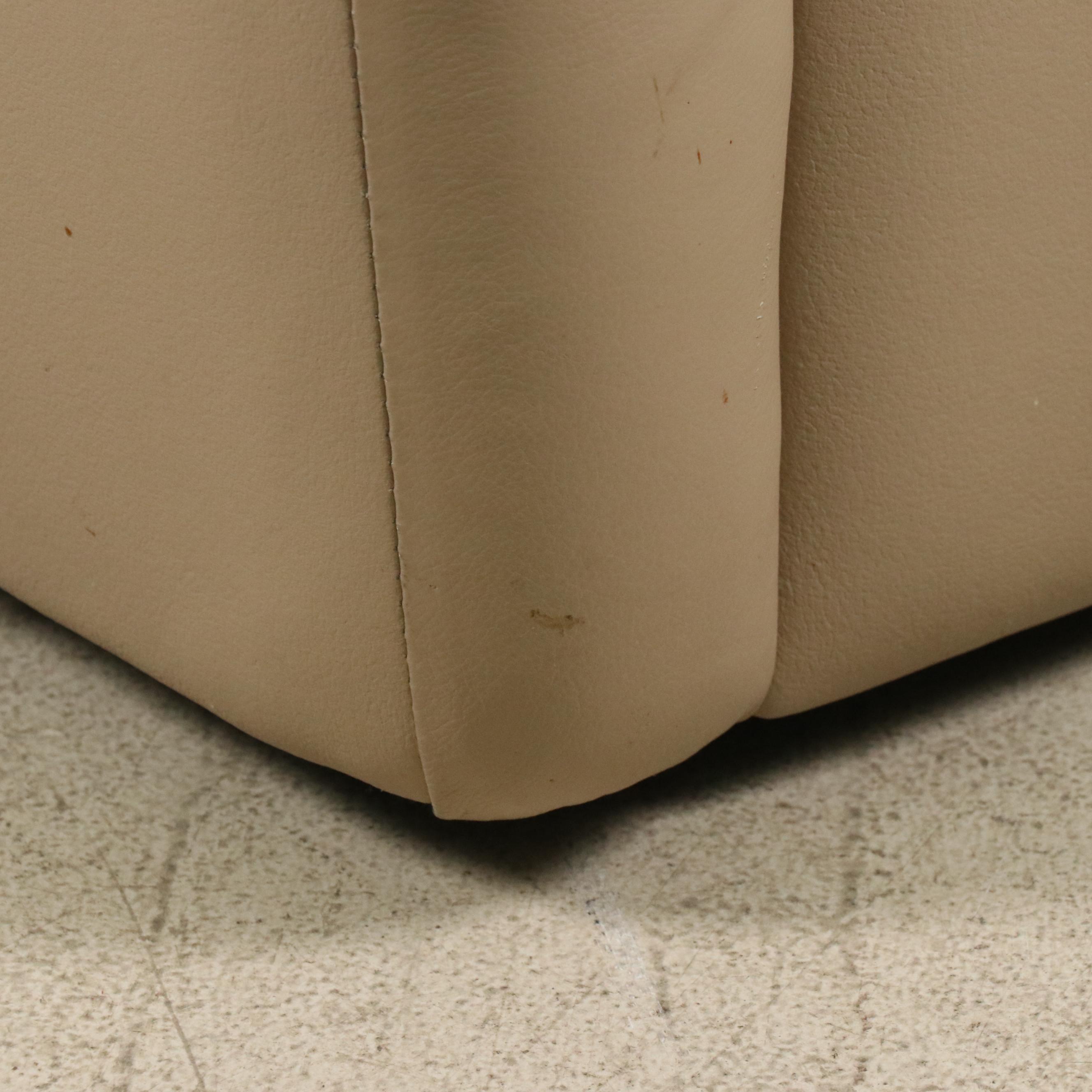 Tan Faux Leather Swivel Armchair