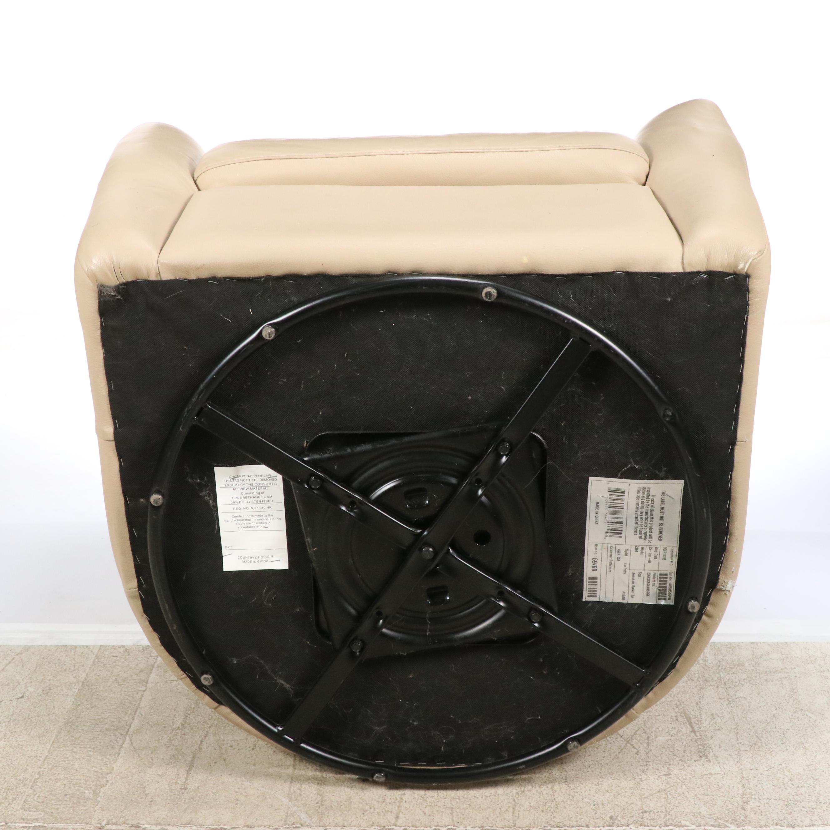 Tan Faux Leather Swivel Armchair