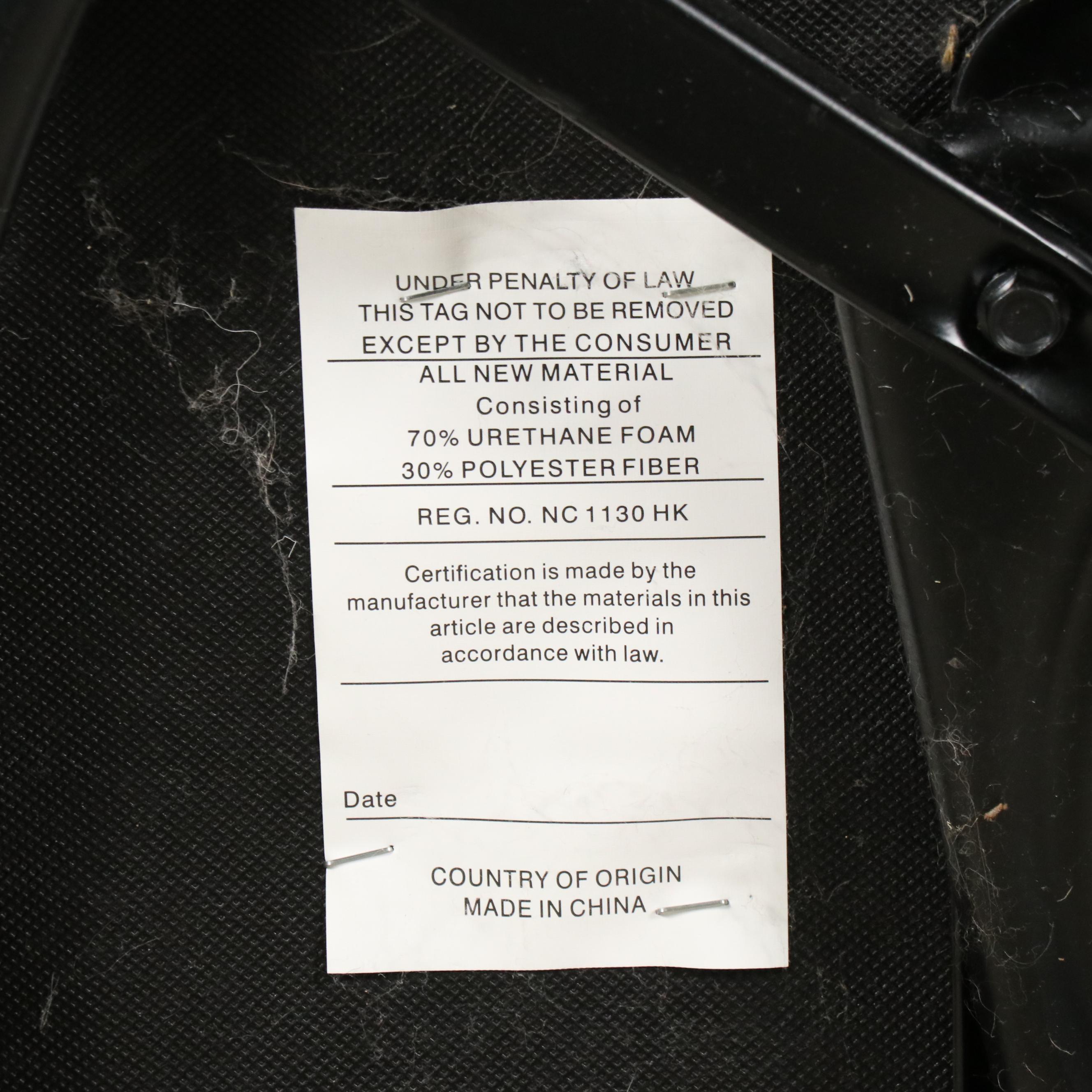 Tan Faux Leather Swivel Armchair