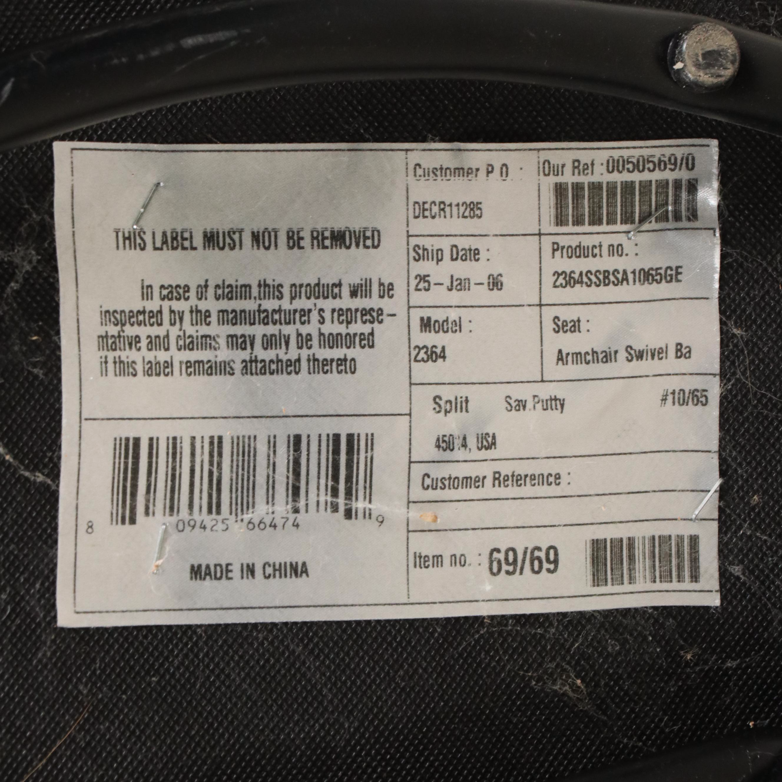 Tan Faux Leather Swivel Armchair