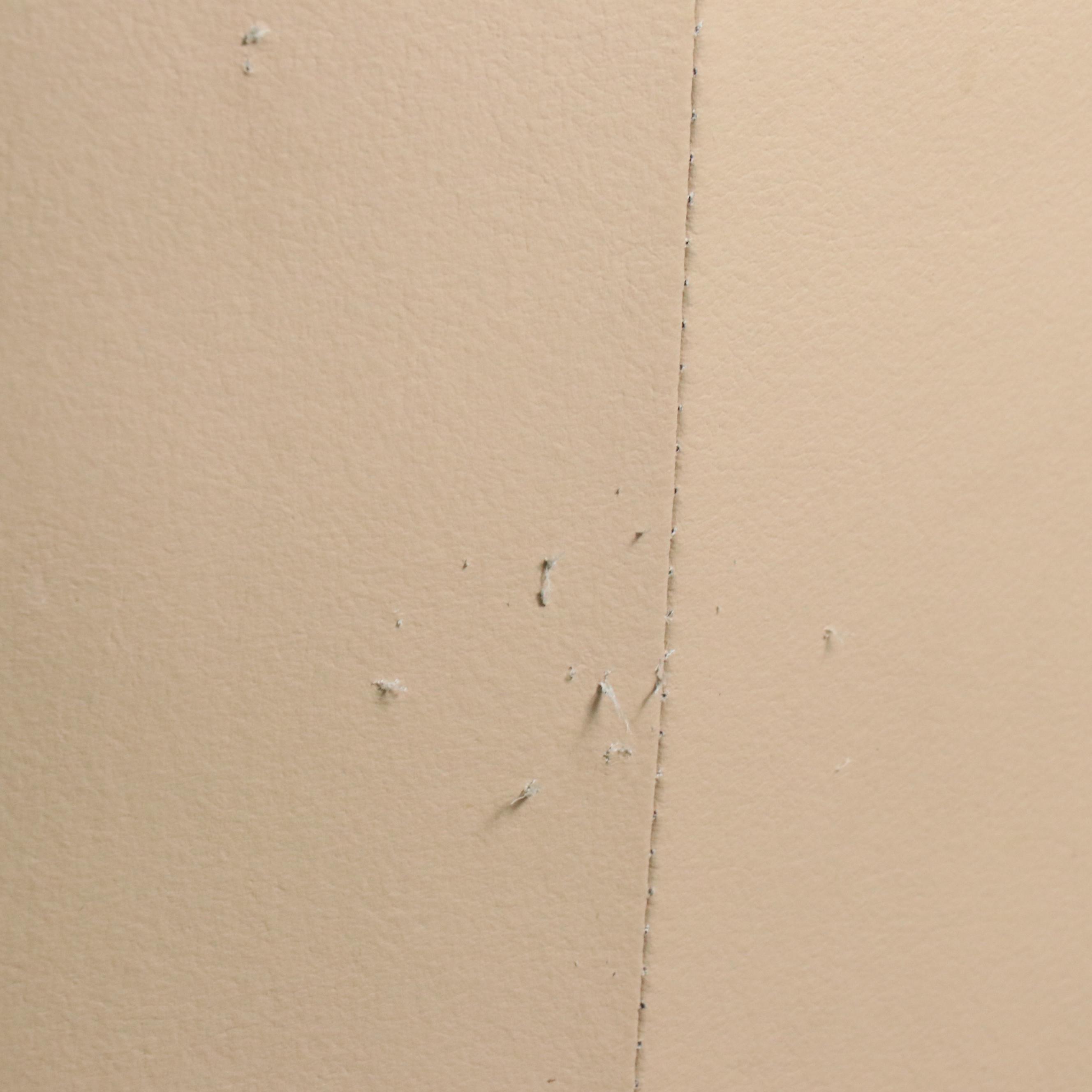 Tan Faux Leather Swivel Armchair