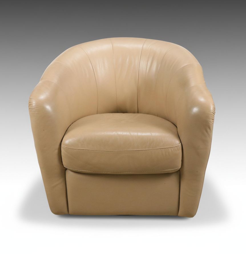 Tan Faux Leather Swivel Armchair