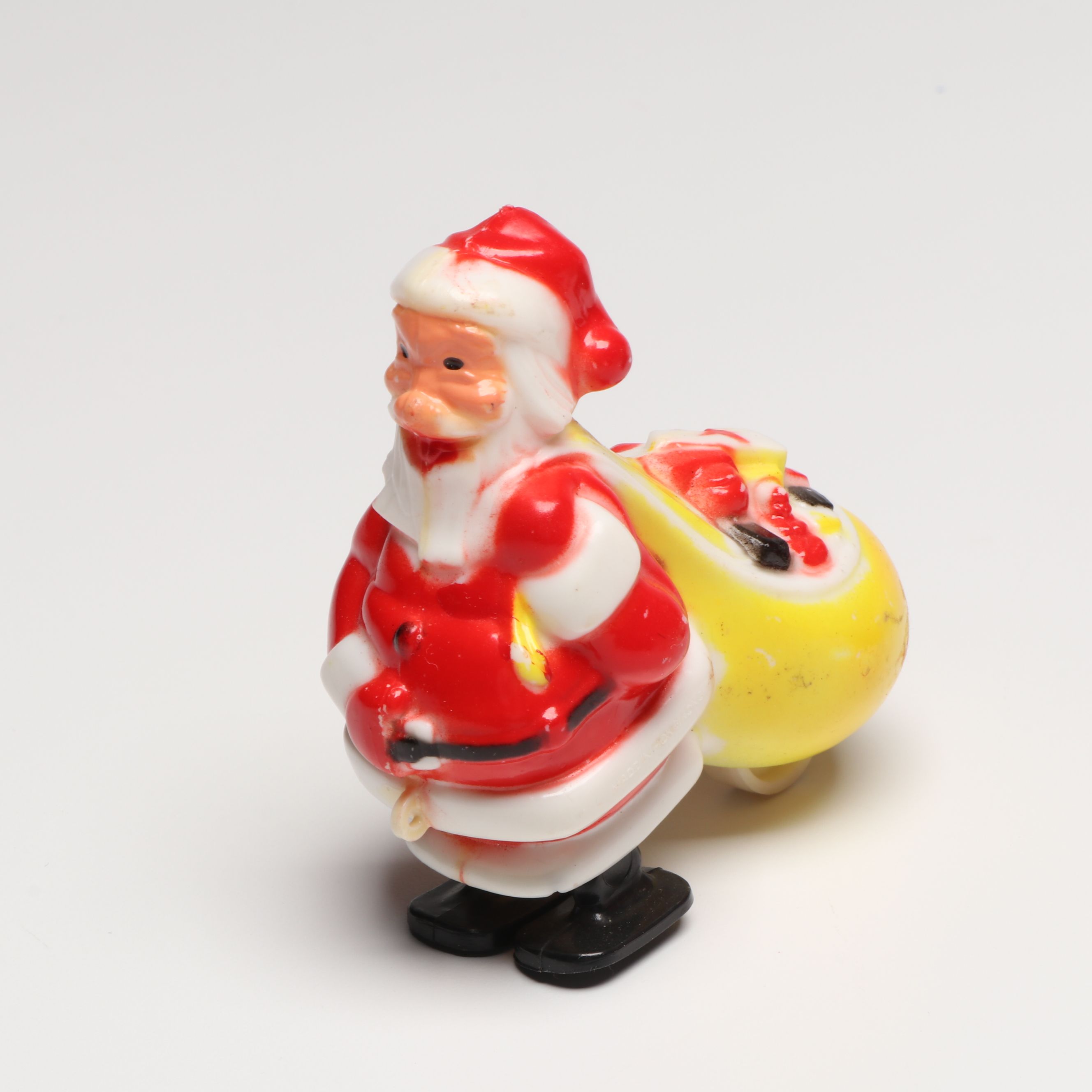 Santa Claus Figure Piggy Bank and Other Christmas Decorations