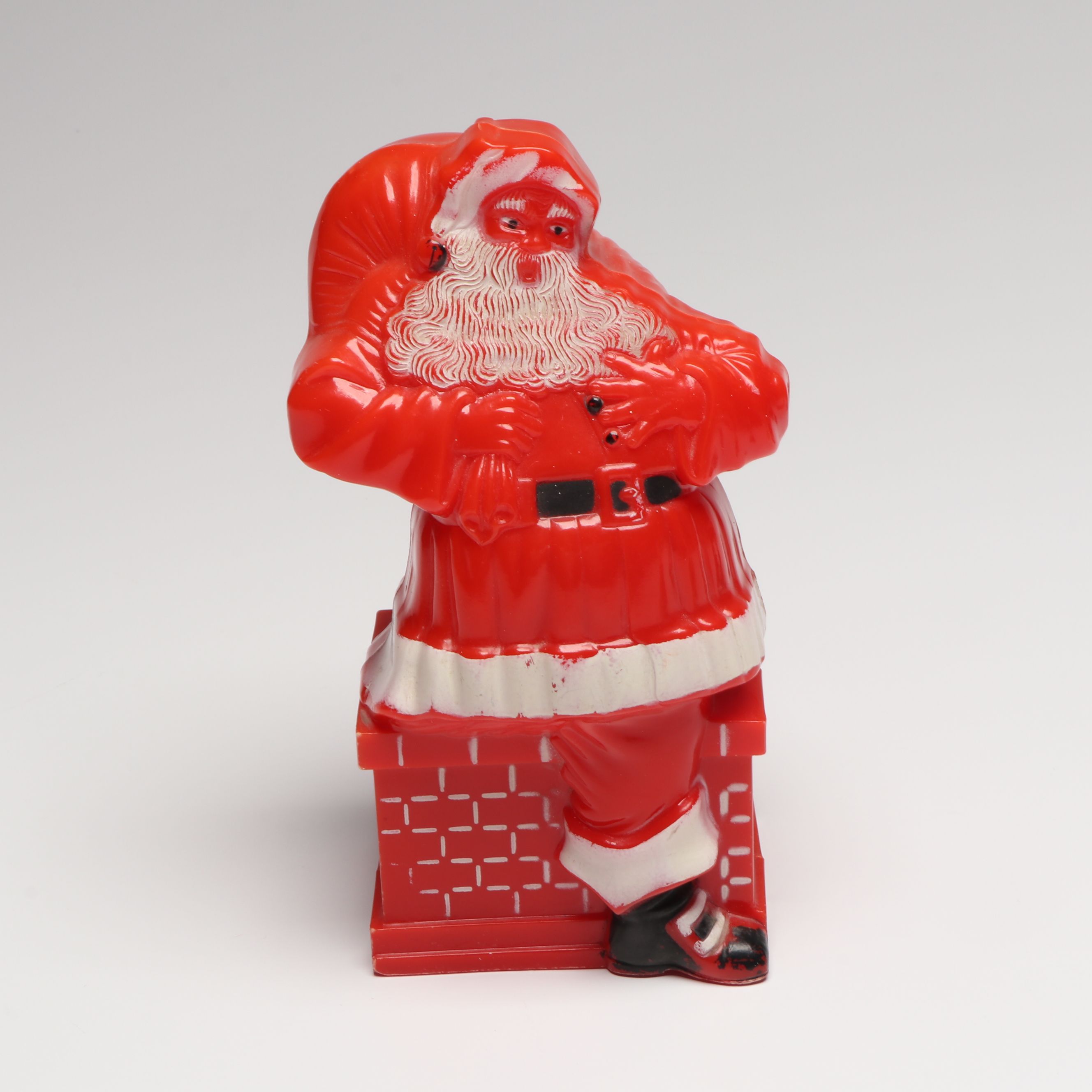 Santa Claus Figure Piggy Bank and Other Christmas Decorations