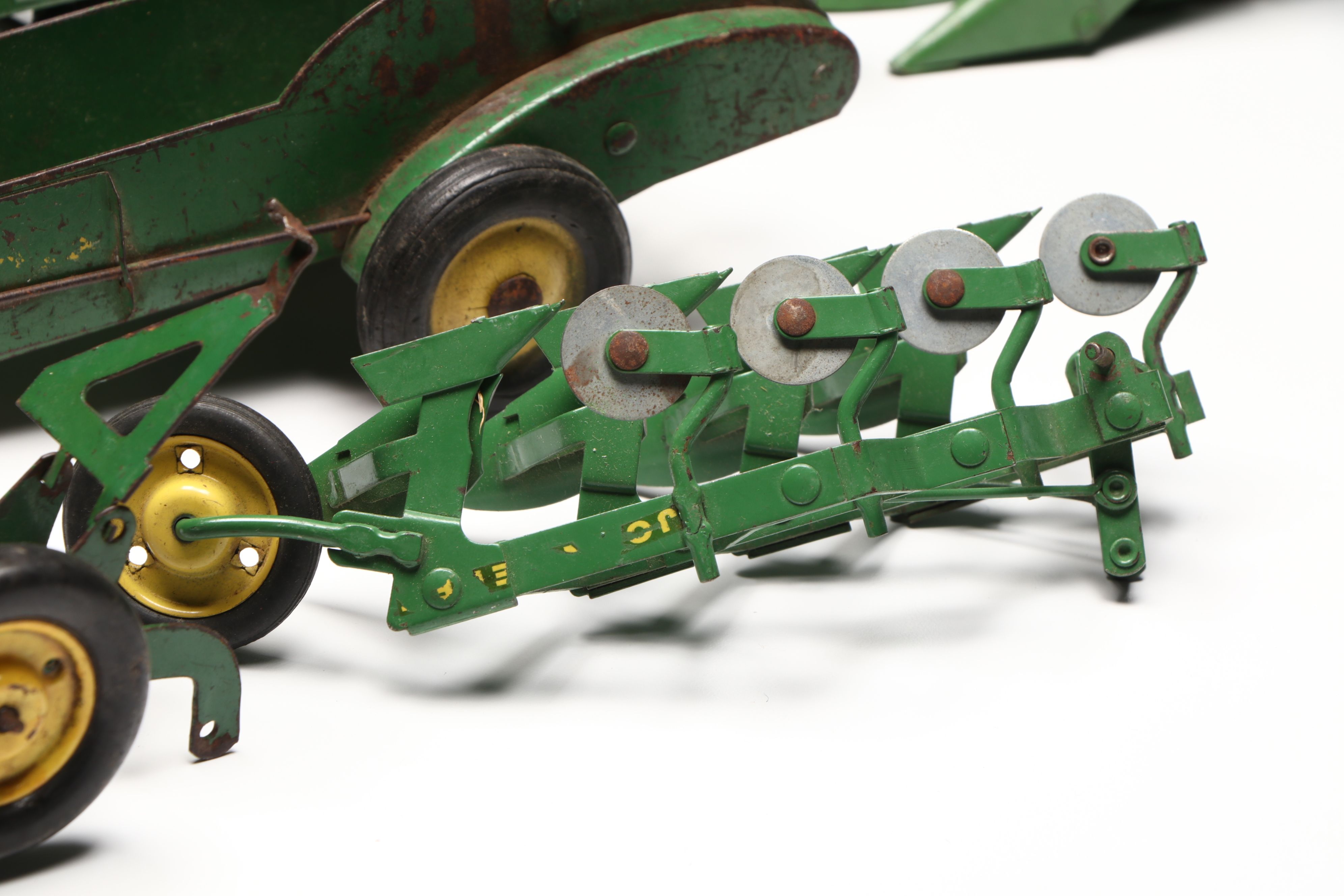 John Deere, Caterpillar, and More Pressed Steel Vintage Farm Vehicle Toys