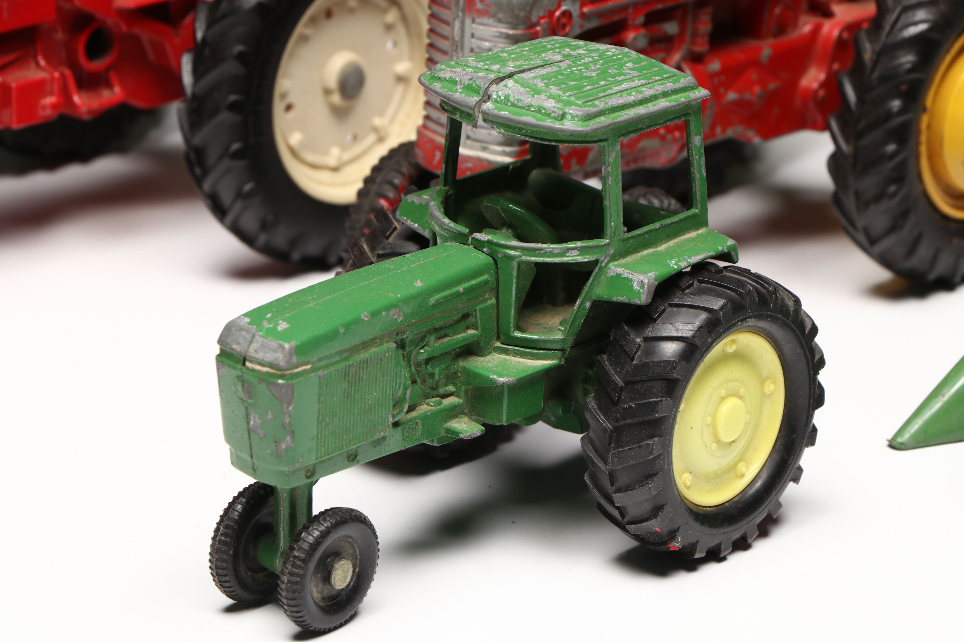 John Deere, Caterpillar, and More Pressed Steel Vintage Farm Vehicle Toys